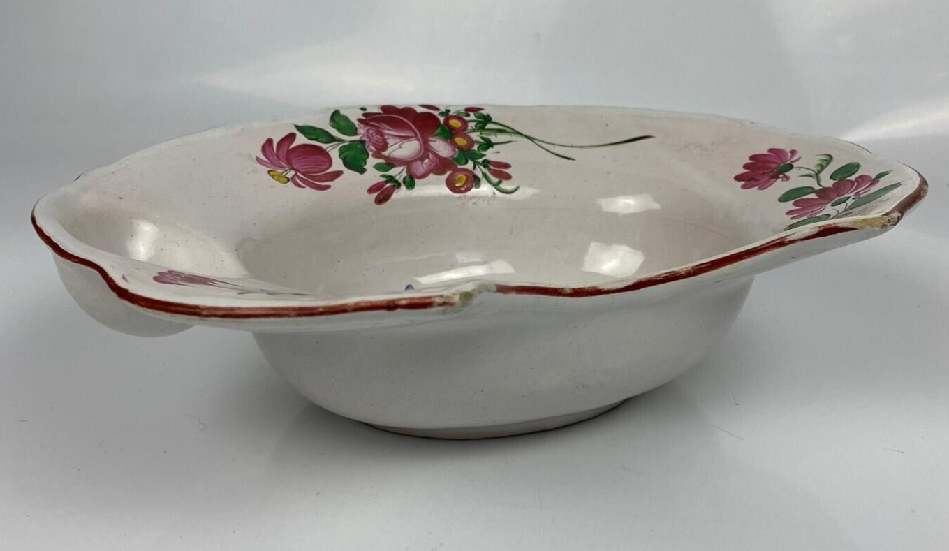 A Strasbourg French Faïence polychrome floral painted barber's bowl. c1790-1820