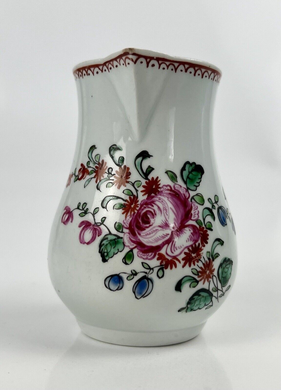 A Philip Christian Liverpool floral-decorated sparrowbeak jug. c.1770