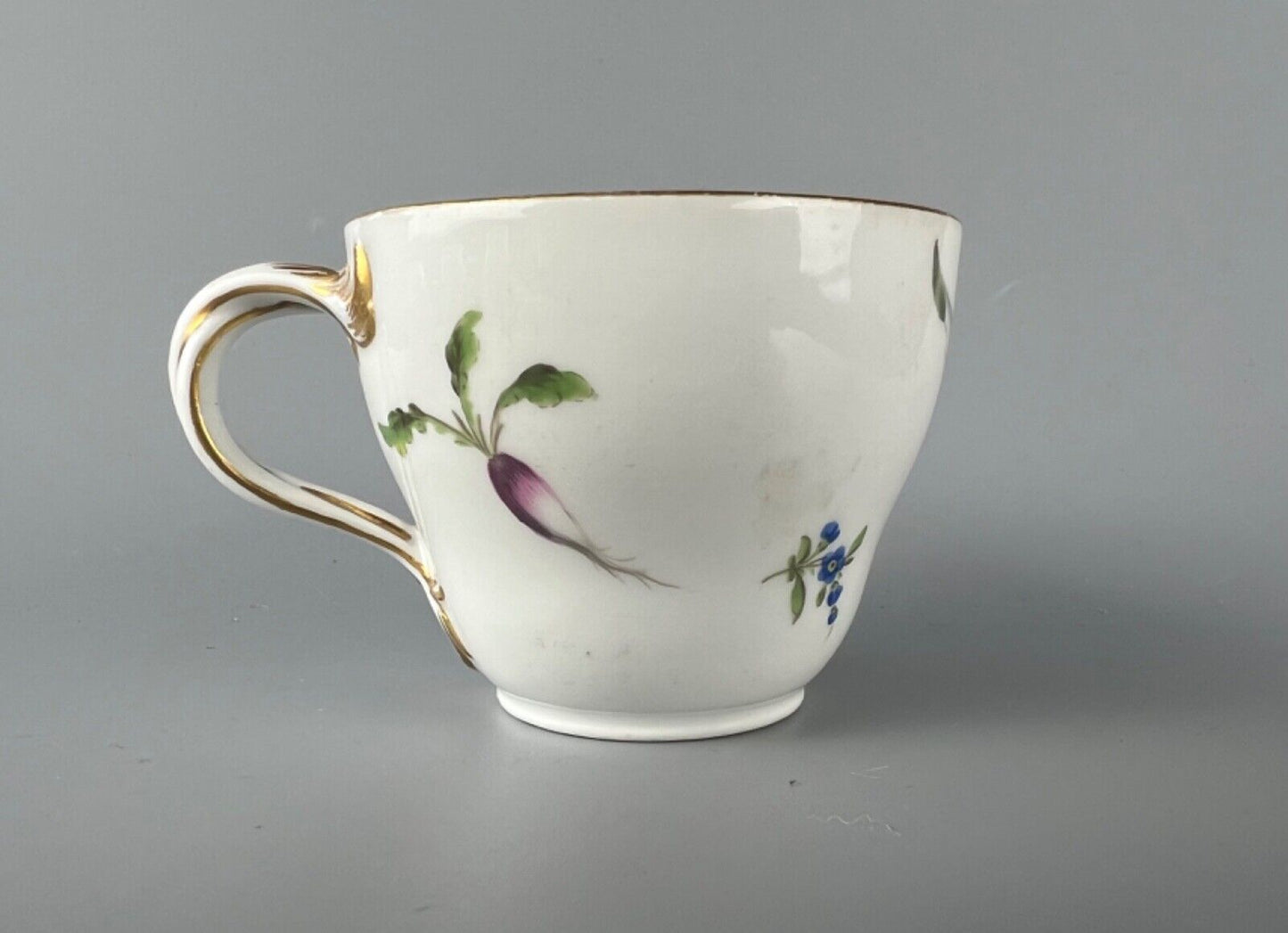A set of four Meissen Marcolini Period c.1800 bifurcated-handle coffee cups.