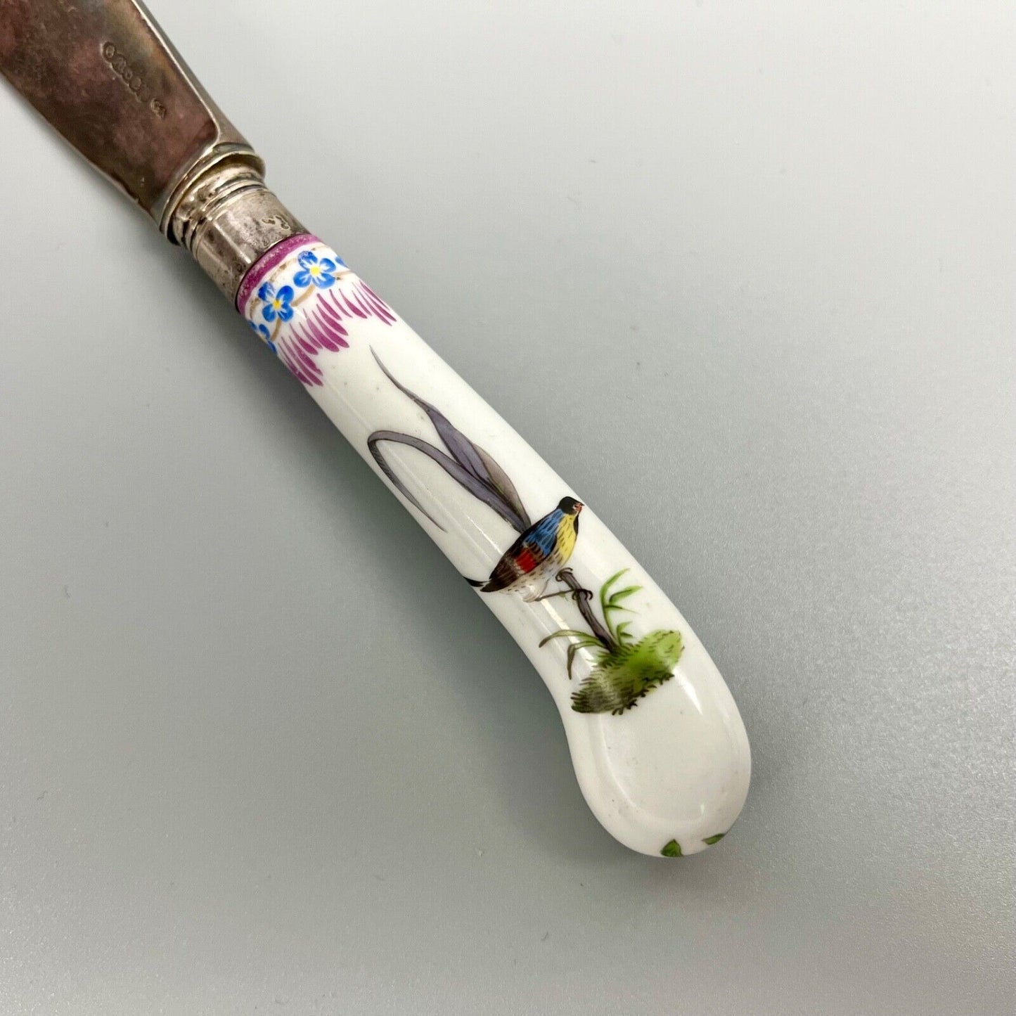 A large German-porcelain-handled steel-bladed dinner knife-the porcelain c.1760.
