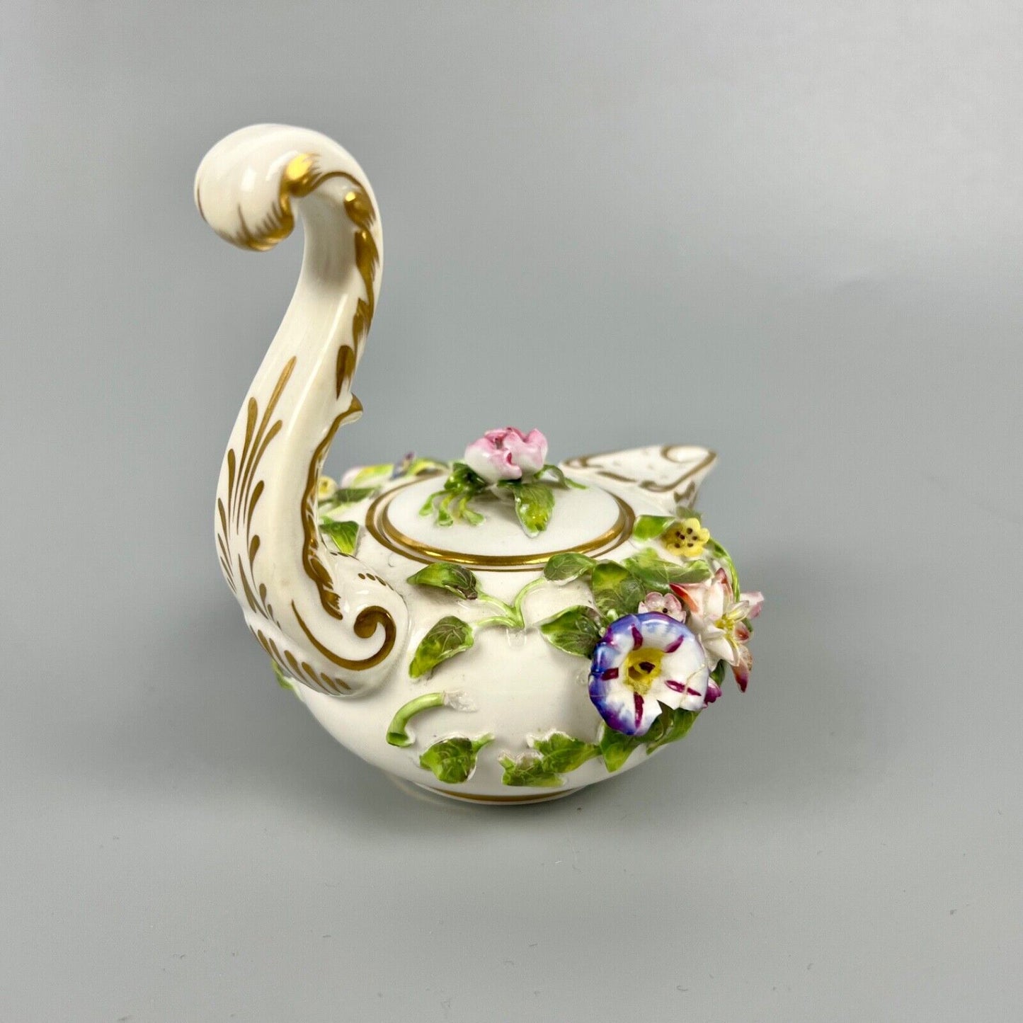 A mid 19thc Derby (Stevenson Hancock-puce version mark) miniature teapot c.1863