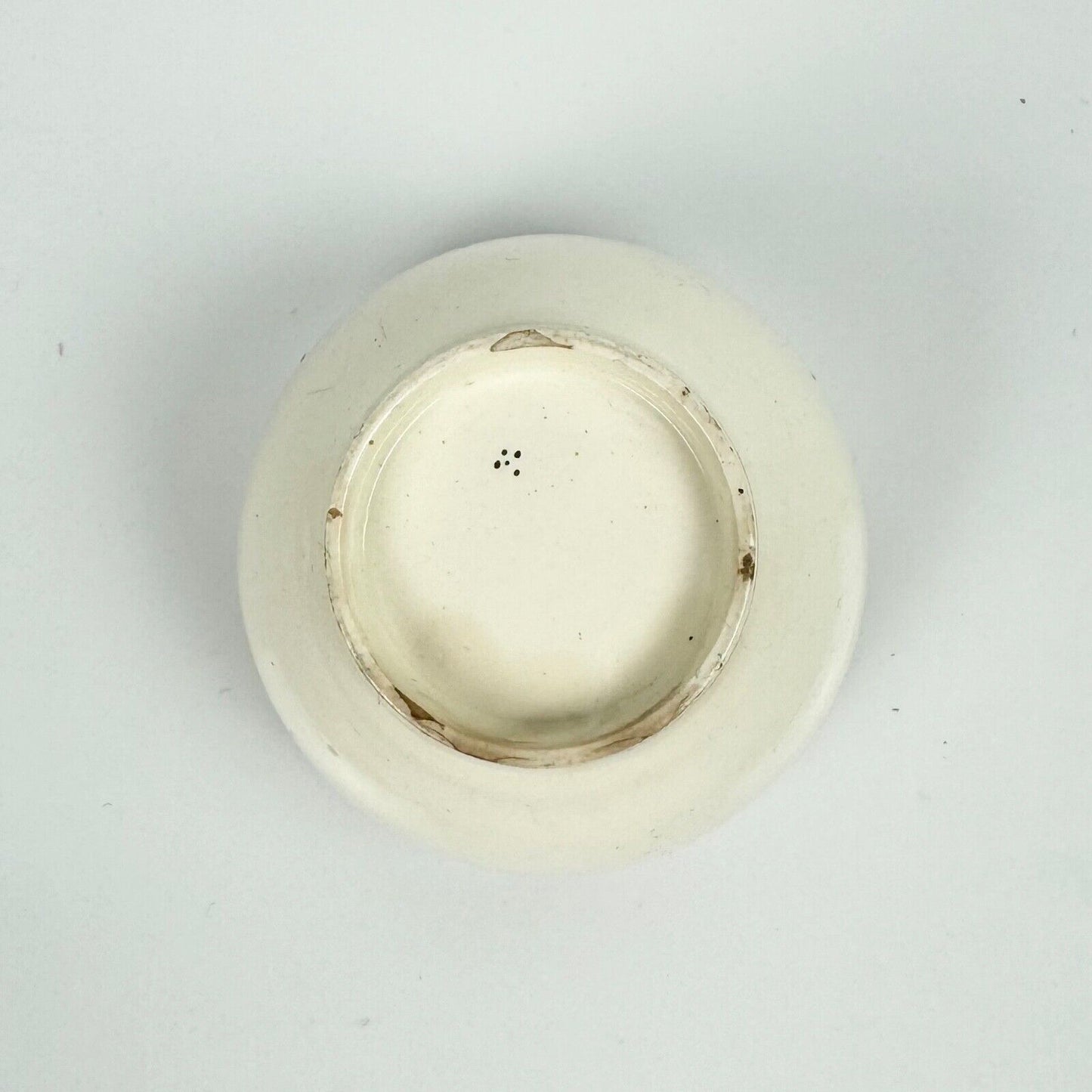 A fine creamware teabowl and saucer with painted foliate decoration. c.1790