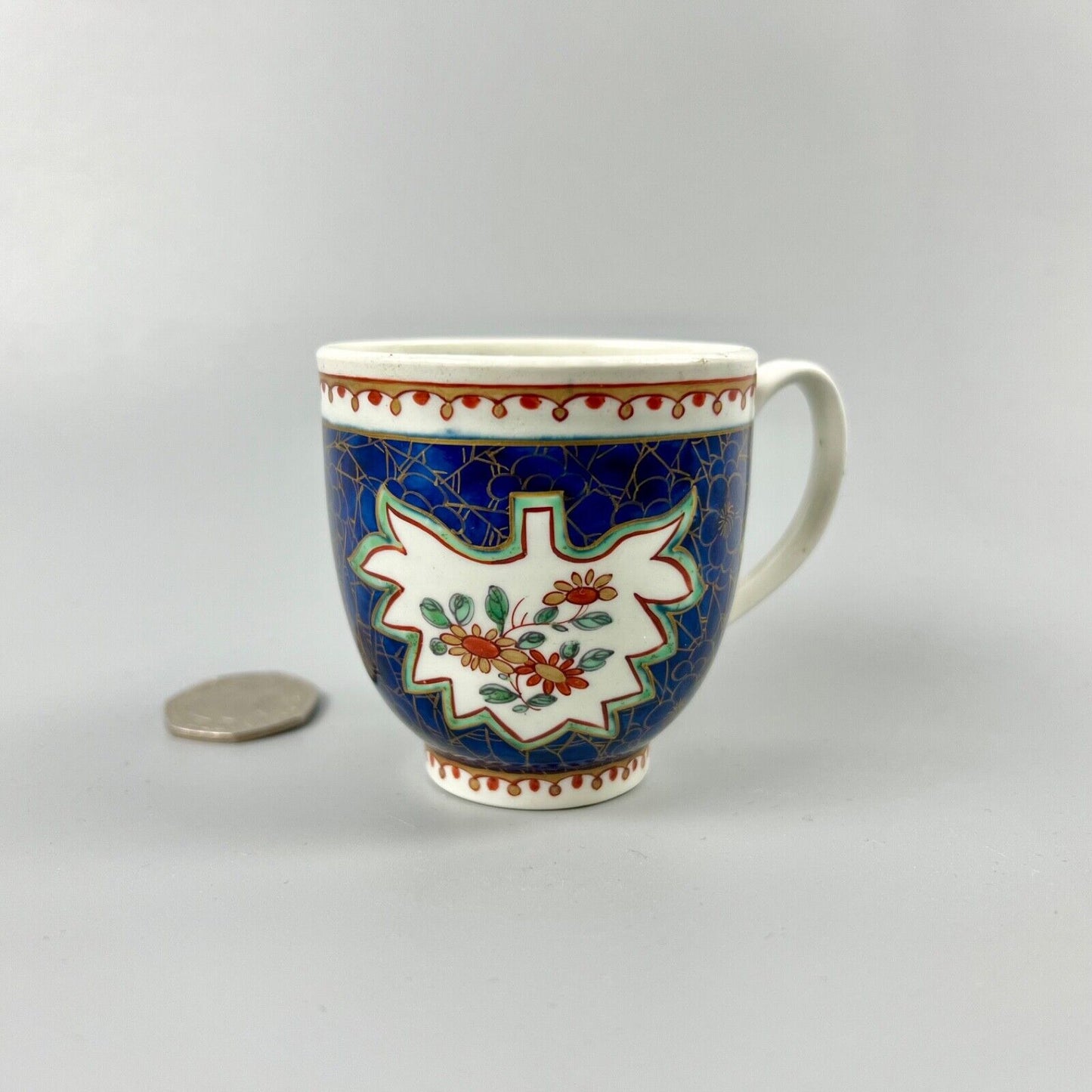 A rare 1st Period Worcester coffee cup in an unusual pattern c.1765-70