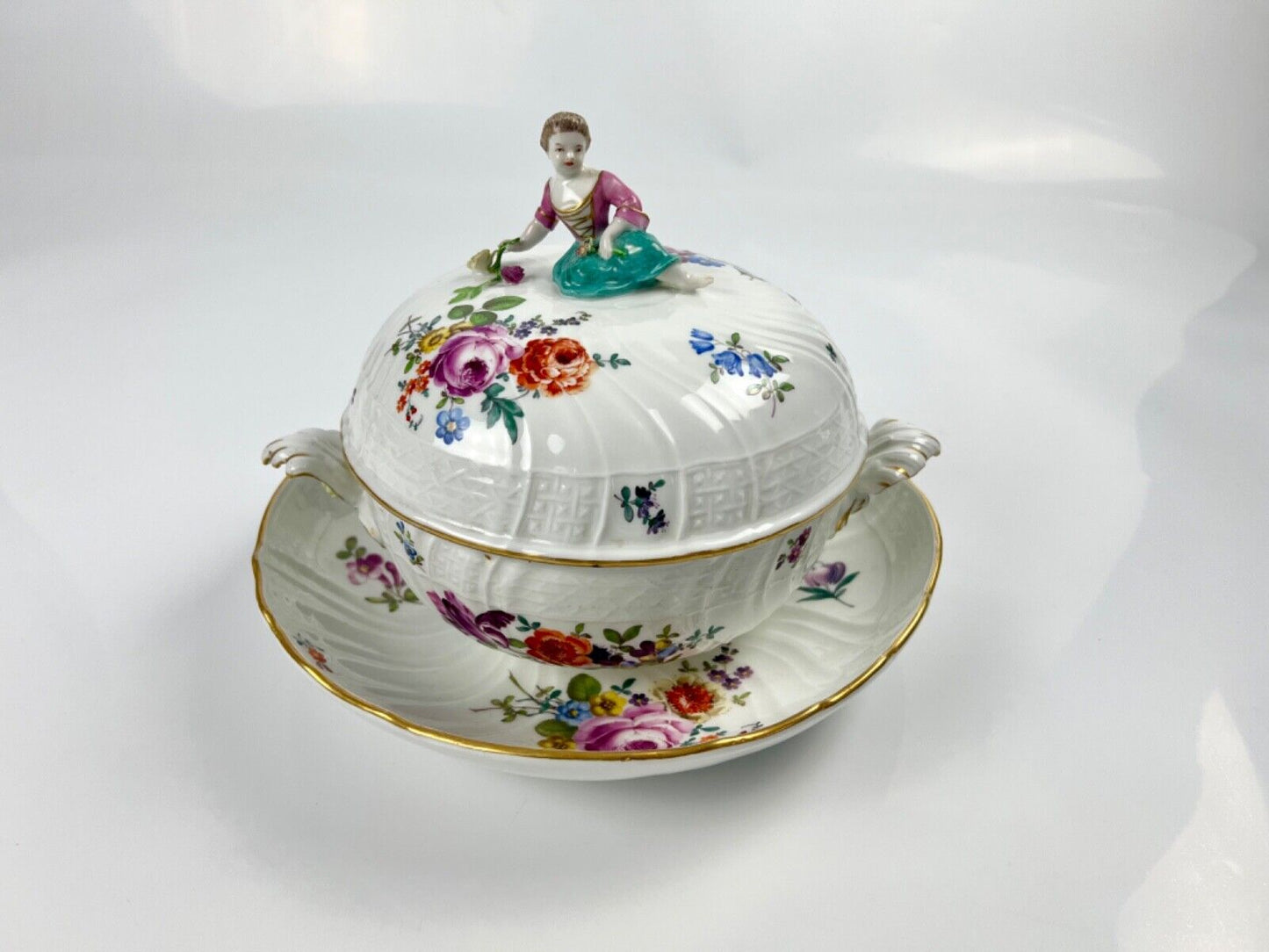 A Meissen Academic Dot Period figural and asparagus handled moulded tureen c1770