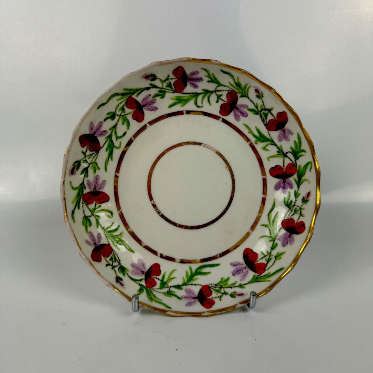 A Pinxton teabowl & saucer in a known pattern of unrecorded number circa 1805