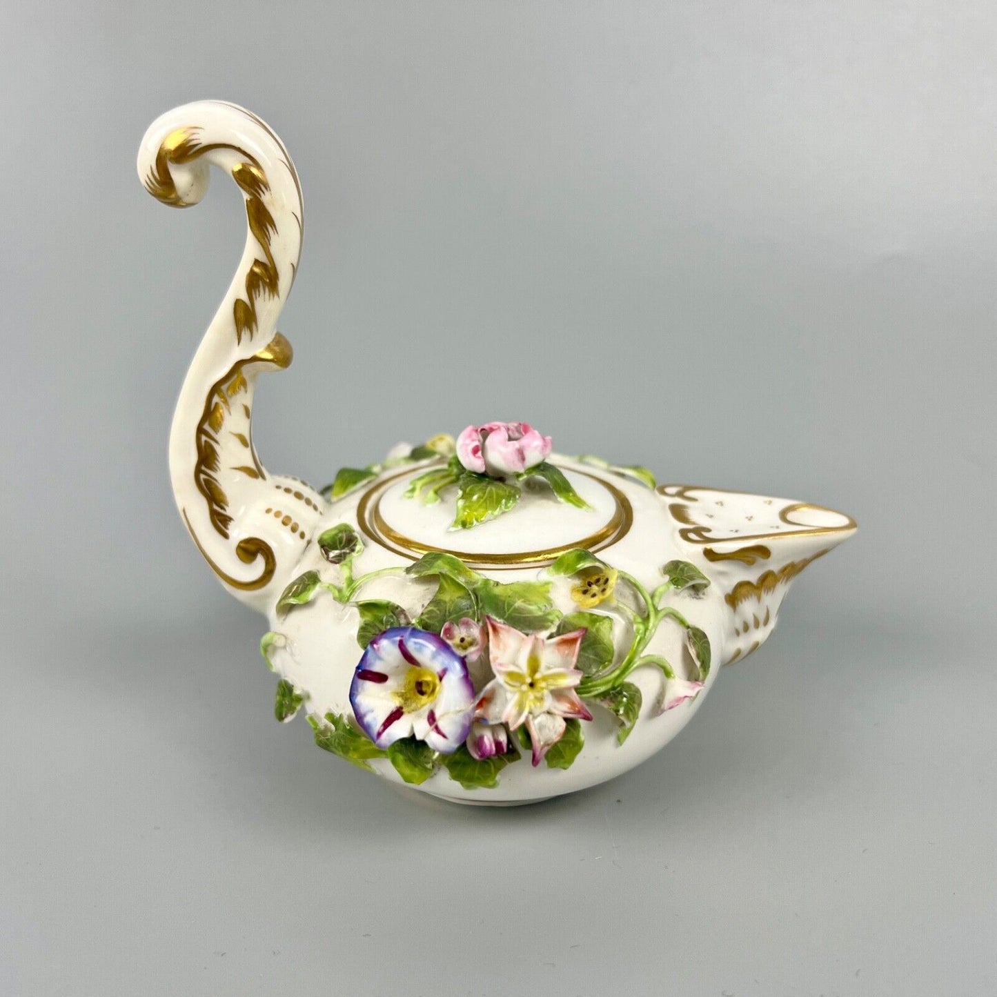 A mid 19thc Derby (Stevenson Hancock-puce version mark) miniature teapot c.1863