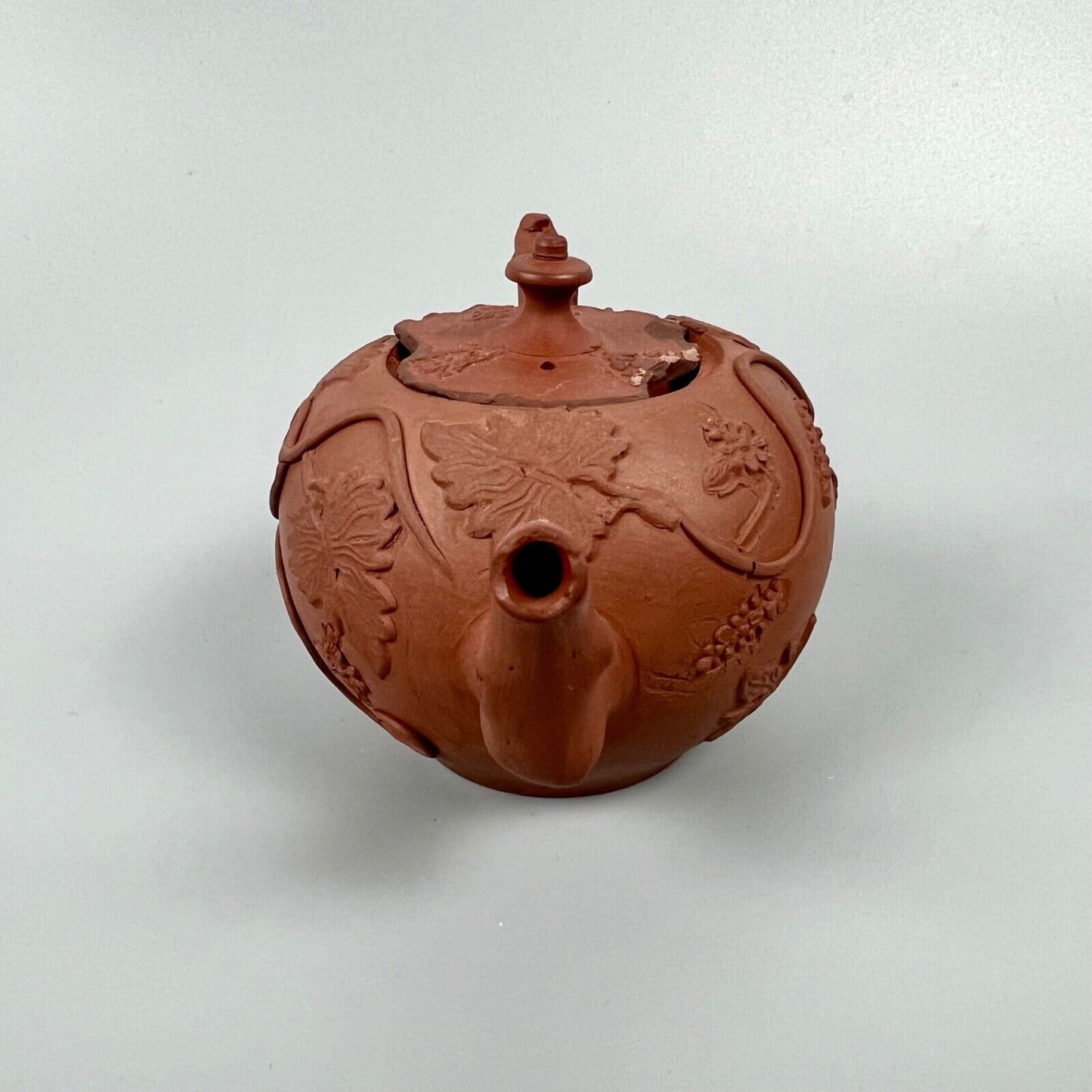 A Diminutive Staffordshire red stoneware teapot with sprigged decoration c.1760