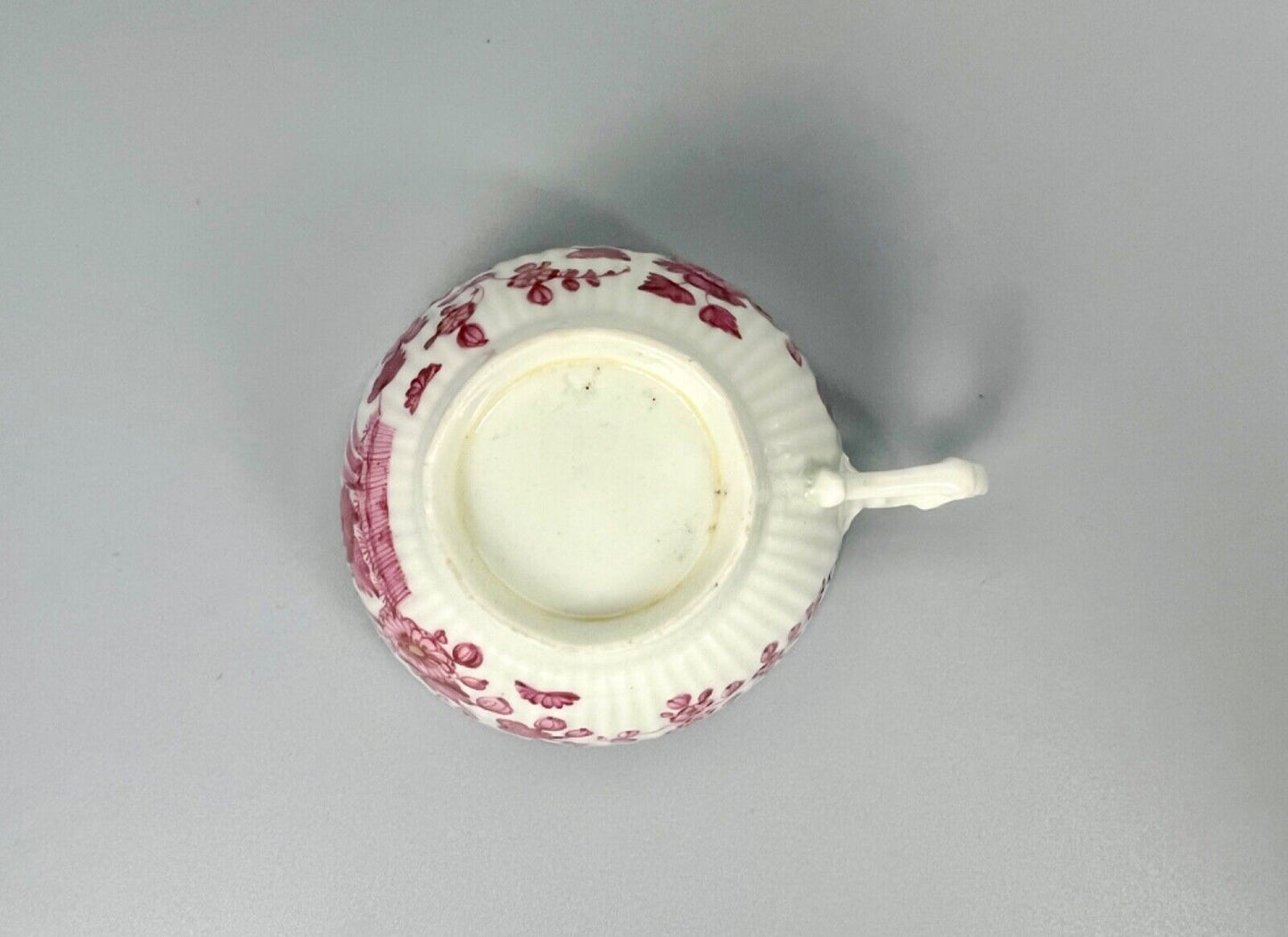 A rare Worcester reeded teacup and saucer painted in Meissen style. c.1772