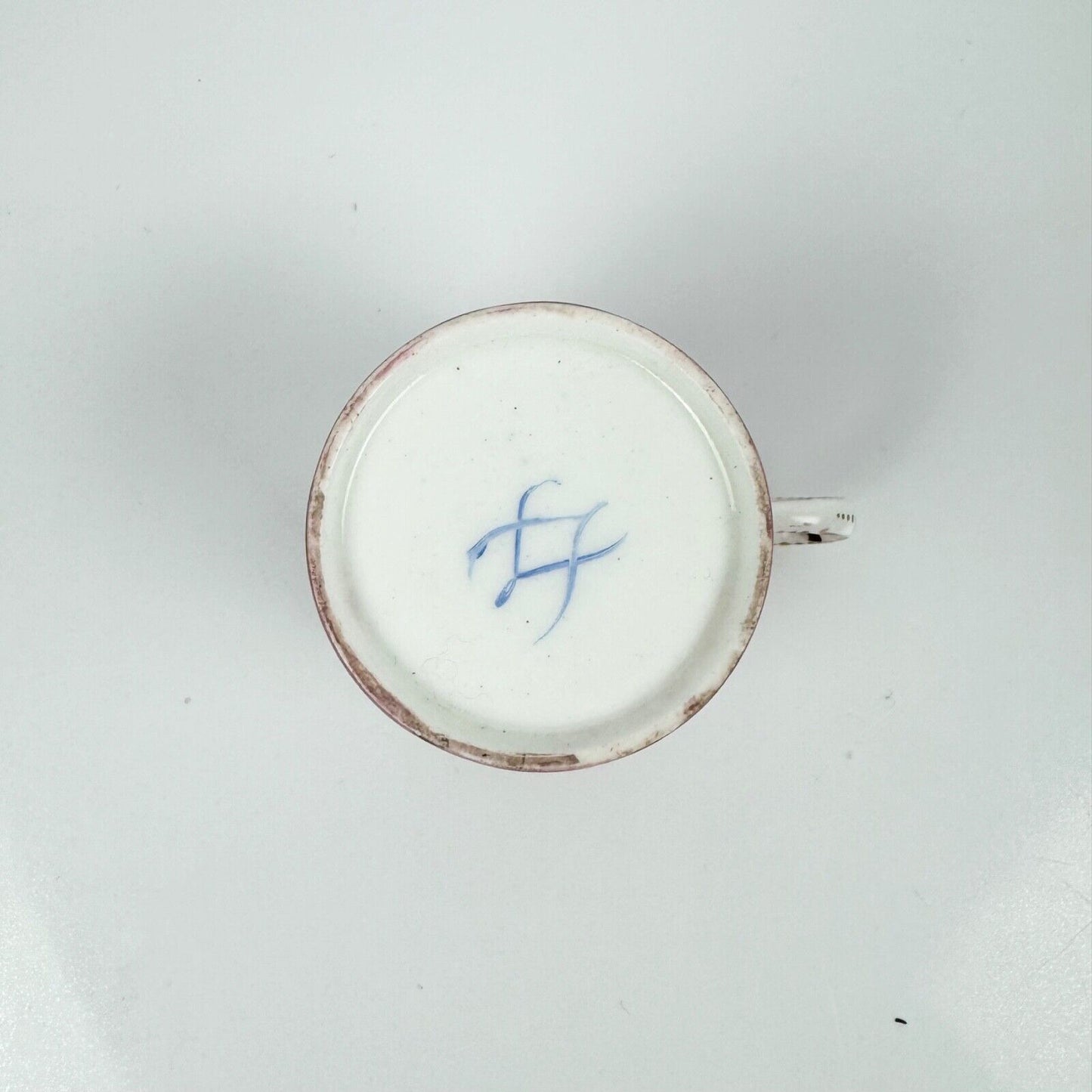 A Sèvres coffee can (gobelet litron) of the 3rd size with tooled gilding. c