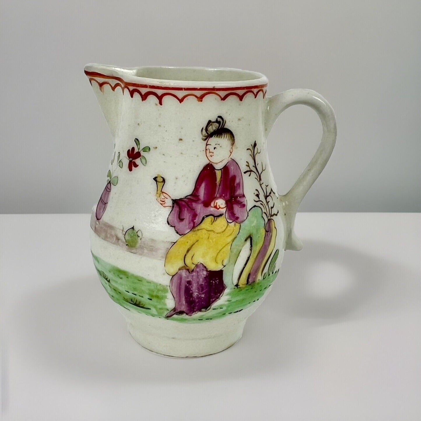 Unusual Lowestoft sparrowbeak creamer painted with a chinoiserie scene c.1770-5