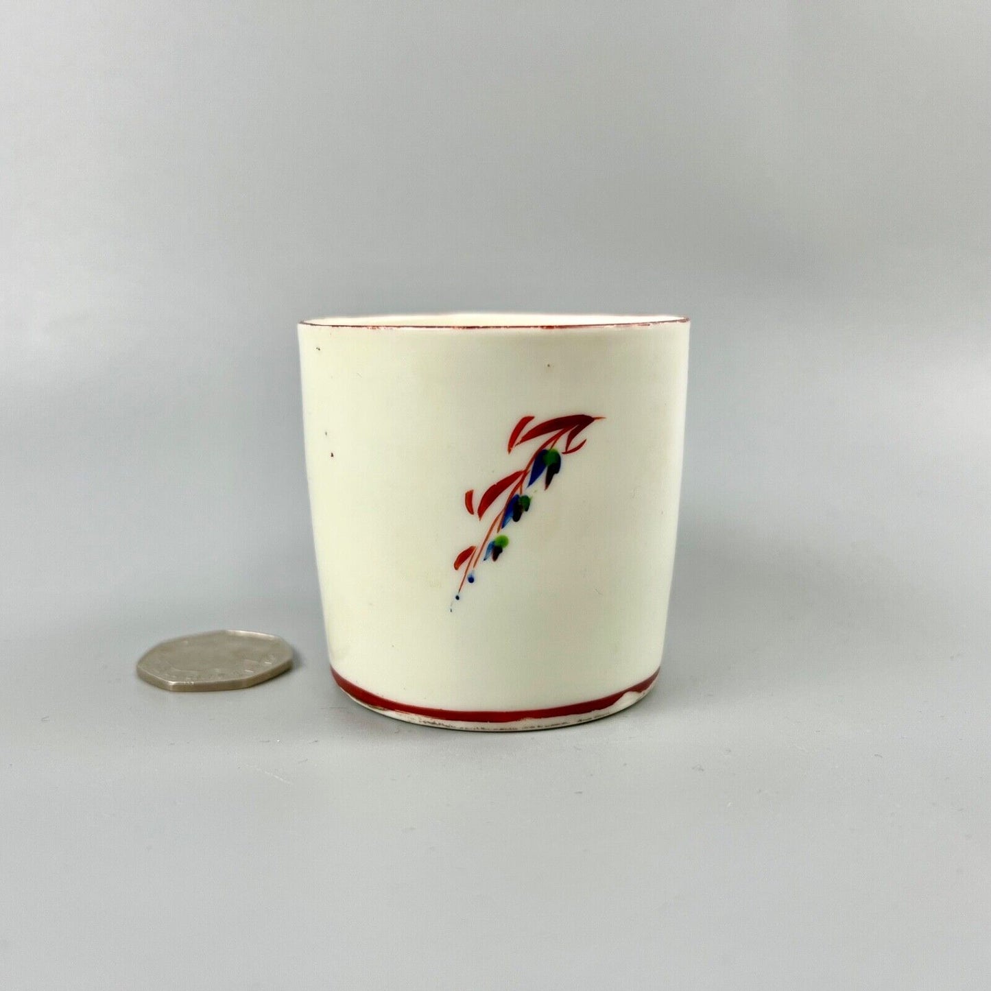 A Pinxton pattern one coffee can painted with Barbeaux Sprigs c1800