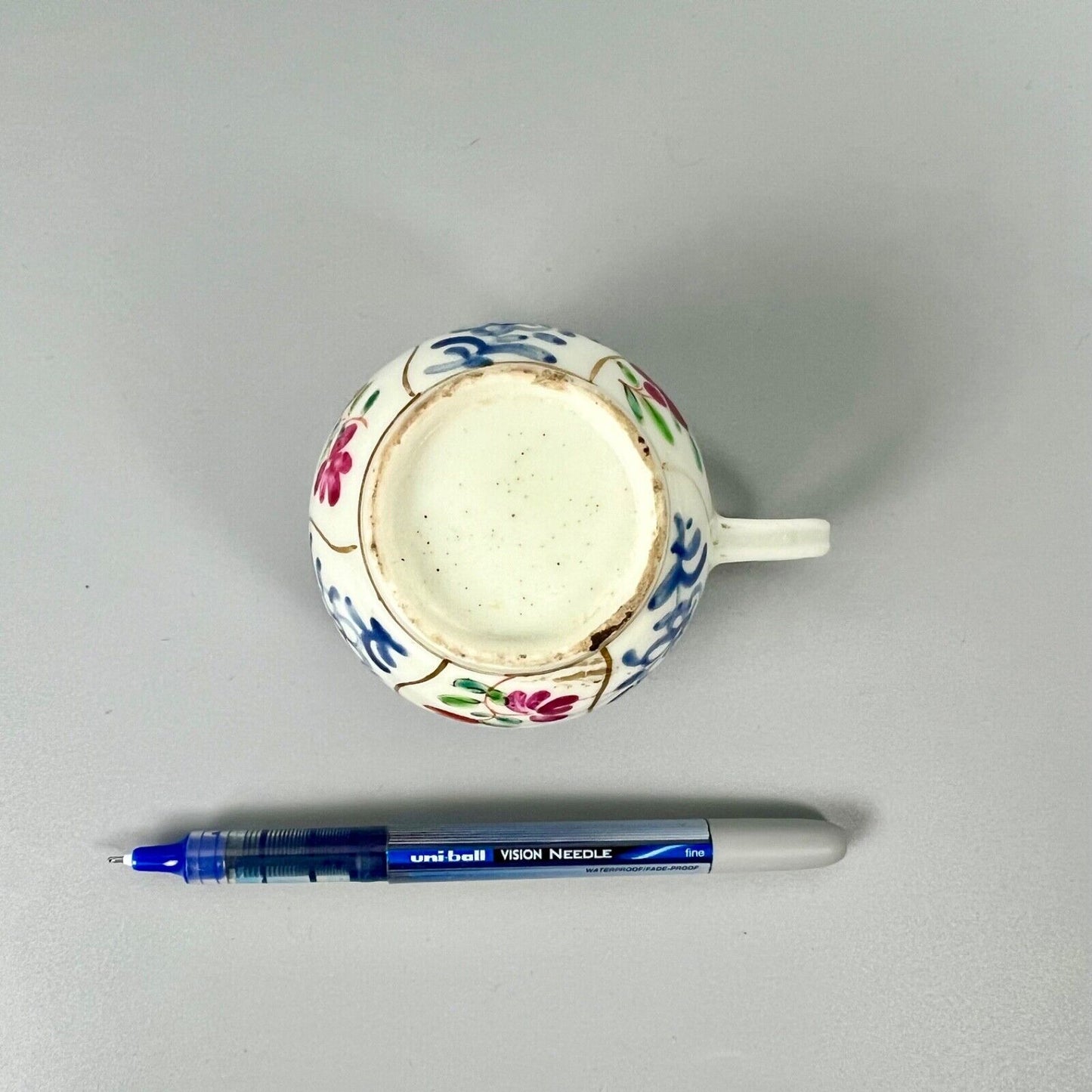 1st Period Worcester outside decorated coffee cup. Gilt trellis inner rim. c1770
