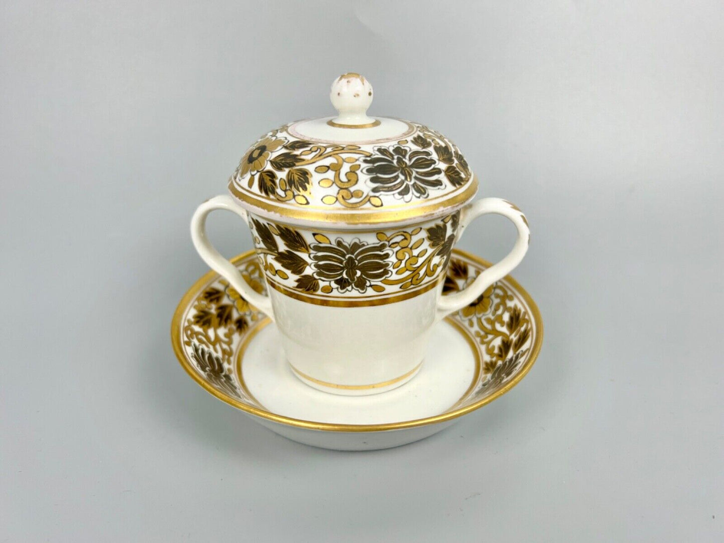A pair of Chamberlain Worcester chocolate cups, covers and stands c1795