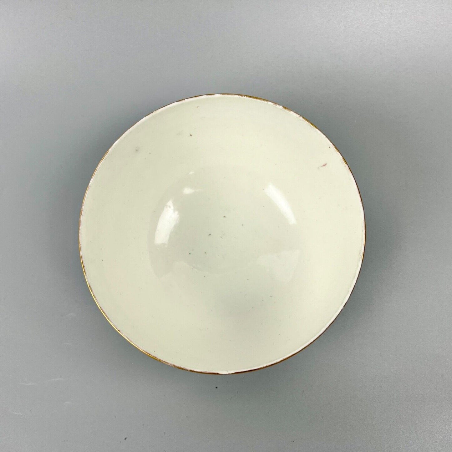 An unrecorded Pinxton slop bowl painted with a meandering black line. c.1810