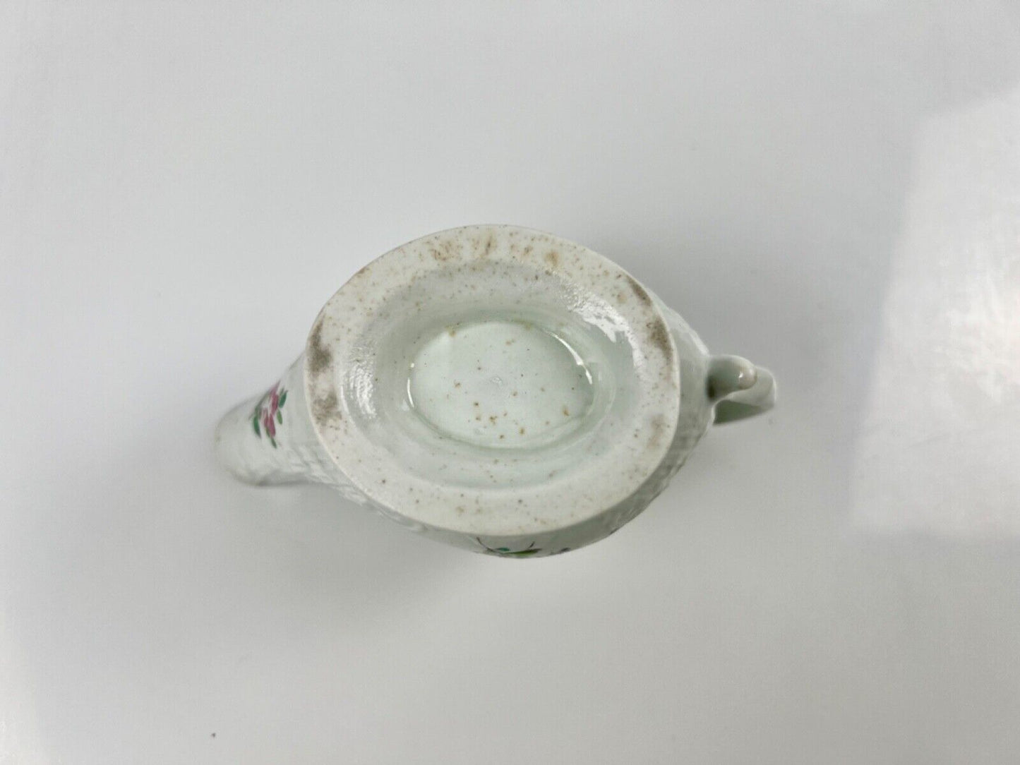 A Philip Christian Liverpool moulded polychrome porcelain sauceboat c.1770