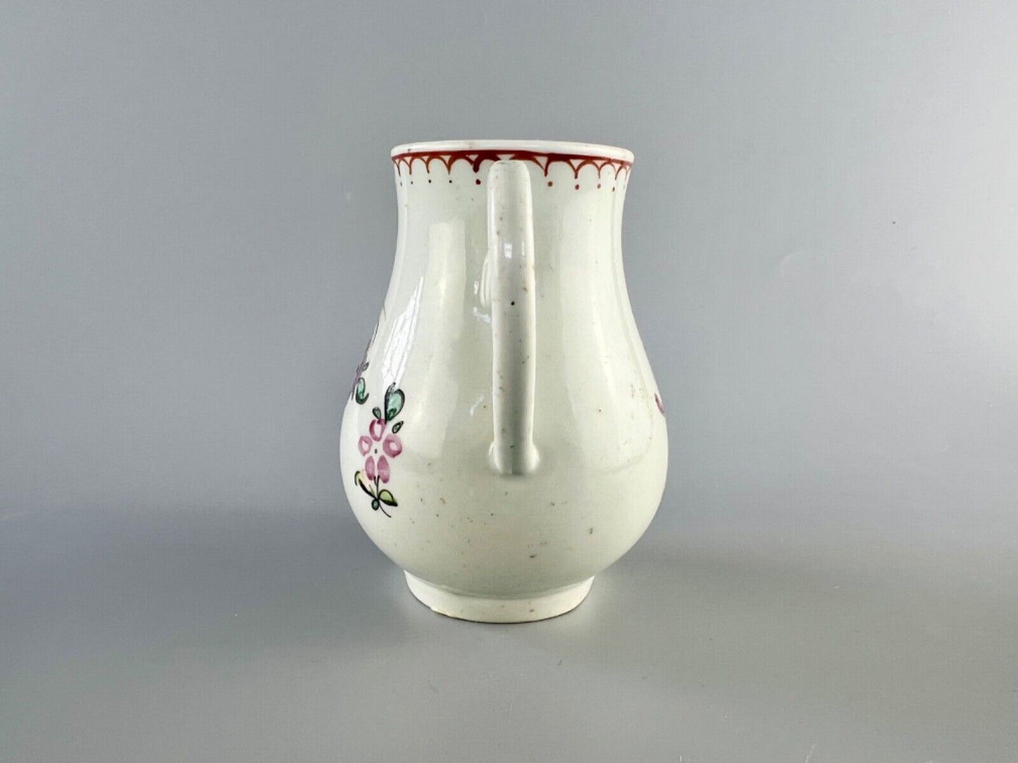 A Philip Christian Liverpool floral-decorated sparrowbeak jug. c.1770