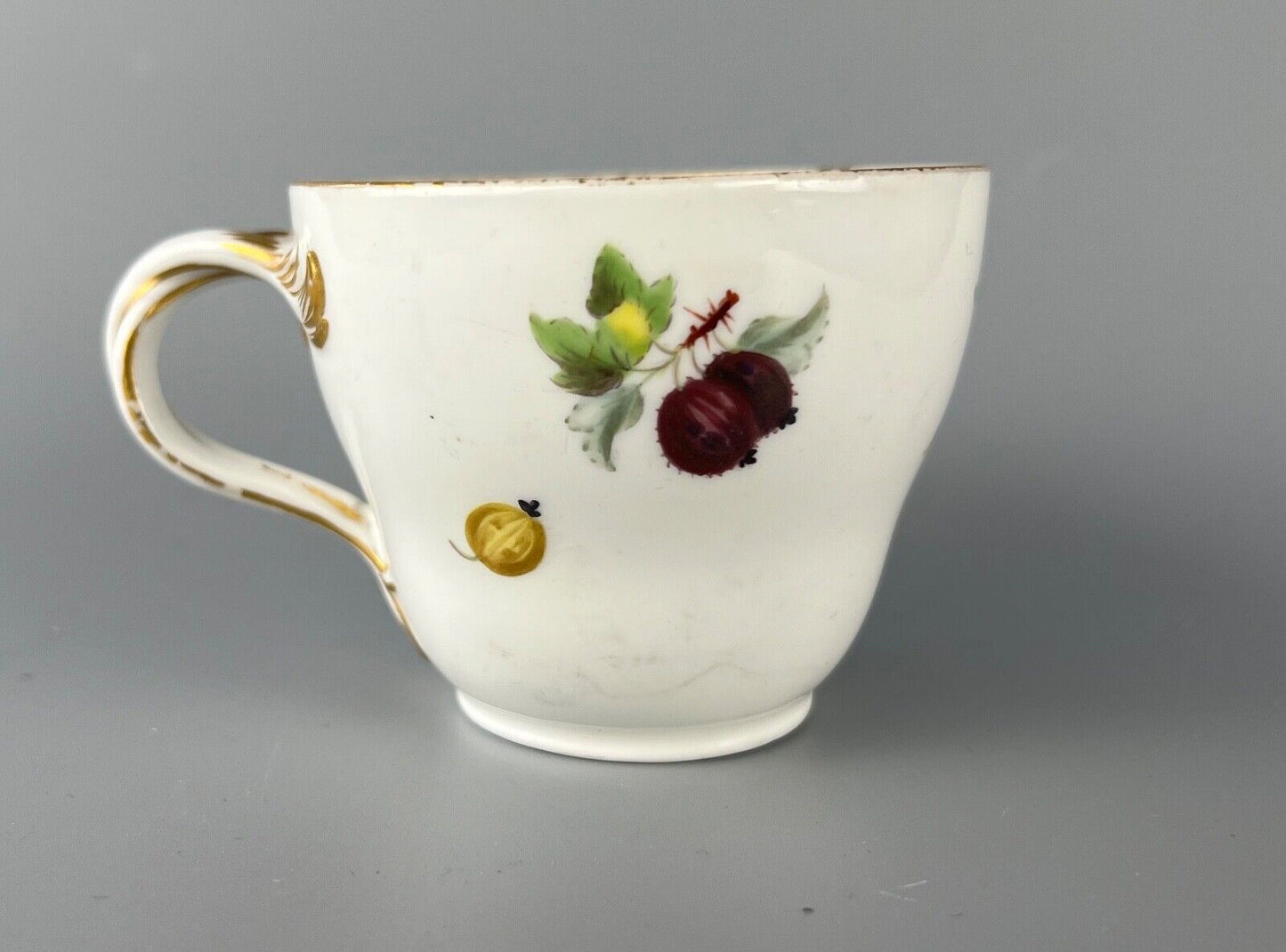 A set of four Meissen Marcolini Period c.1800 bifurcated-handle coffee cups.