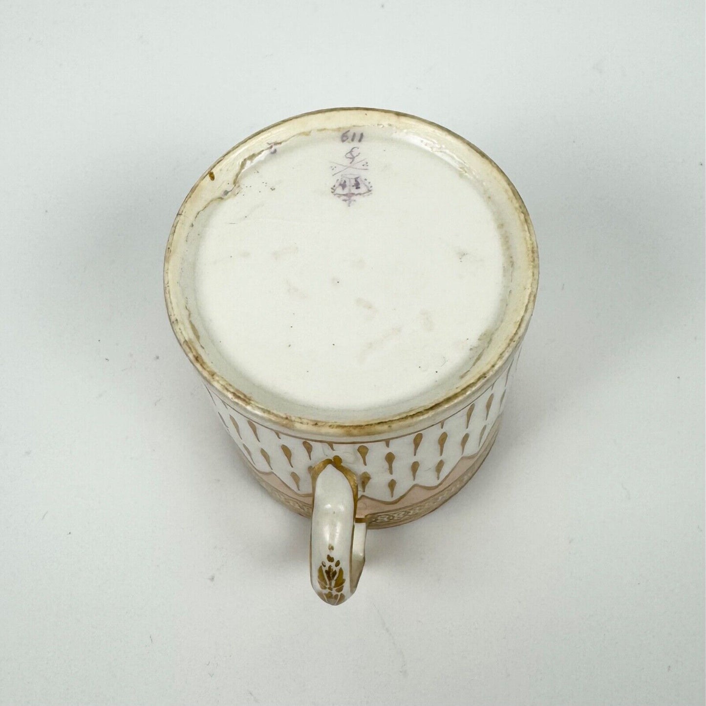 A Derby cabaret can and saucer, circa 1795. Pattern 119. Unusual handle.