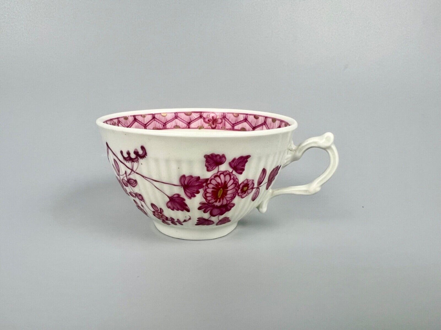 A rare Worcester reeded teacup and saucer painted in Meissen style. c.1772