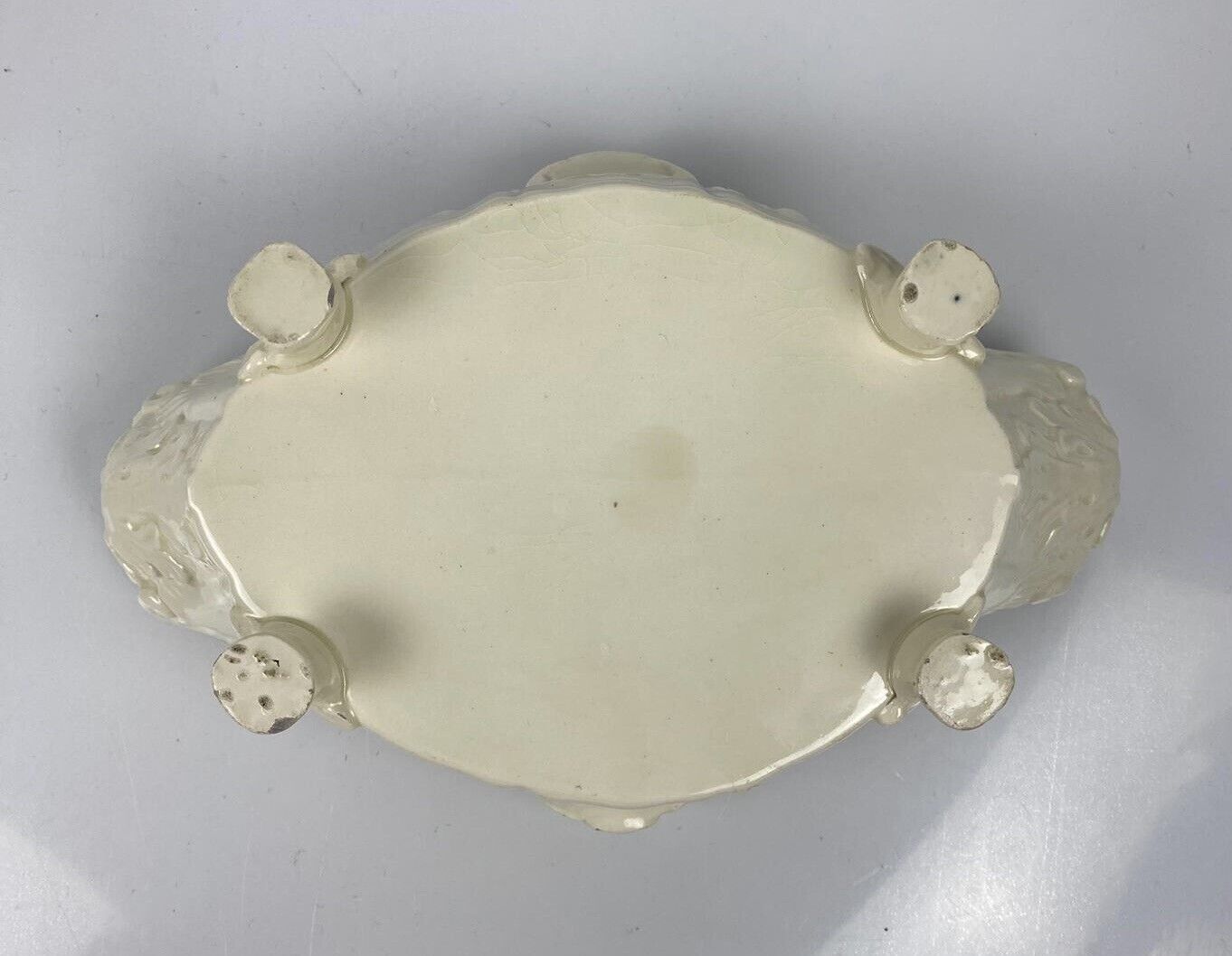 Continental creamware oil and vinegar cruet with relief decoration. c.1790-1810