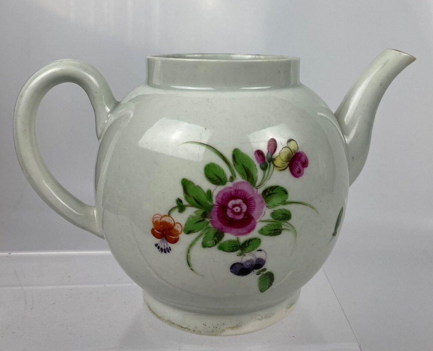 A First Period Worcester Teapot Painted With Floral Sprays And Insects c1770