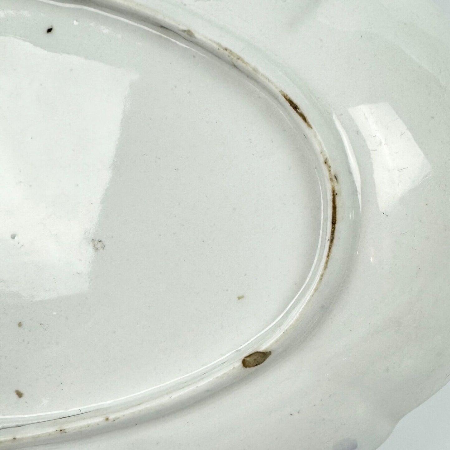 A Chelsea lobed dish painted with an urn and neo classical decoration. c.1760