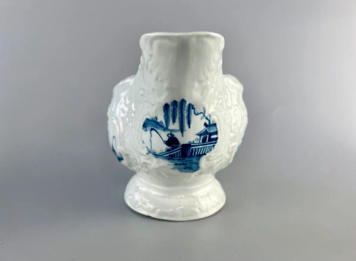 Christian Liverpool porcelain moulded sauceboat with oriental decoration. c.1770