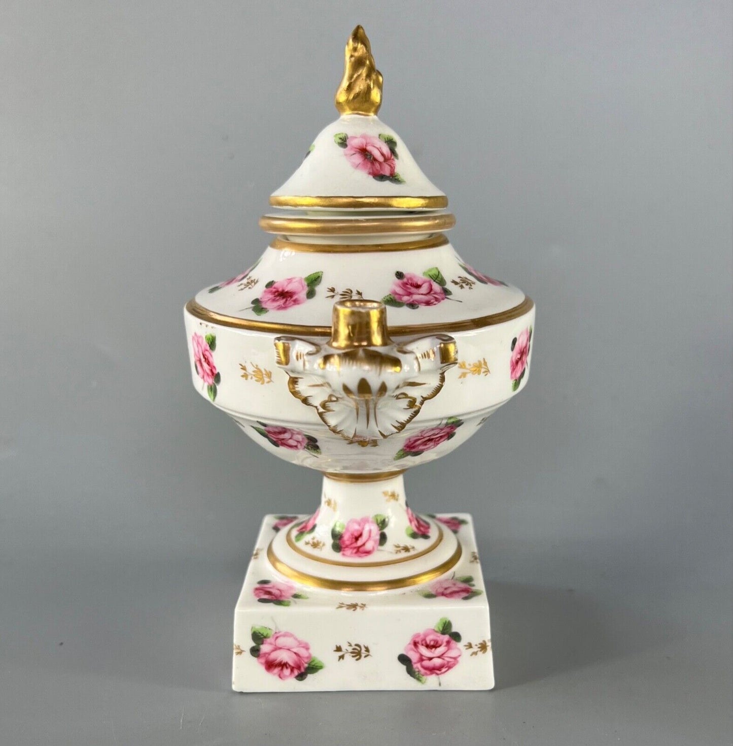An early 19thc Derby inkstand painted with roses c1810-15. Red mark.