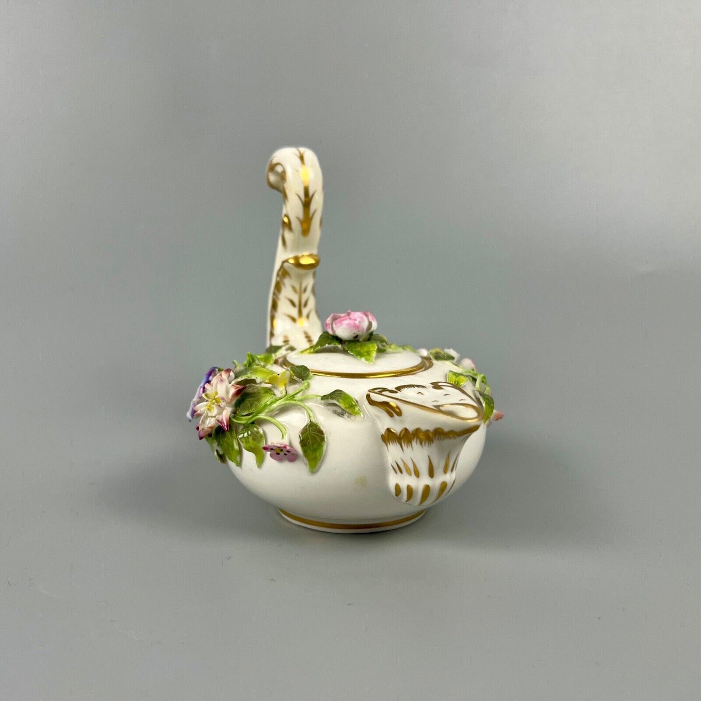 A mid 19thc Derby (Stevenson Hancock-puce version mark) miniature teapot c.1863