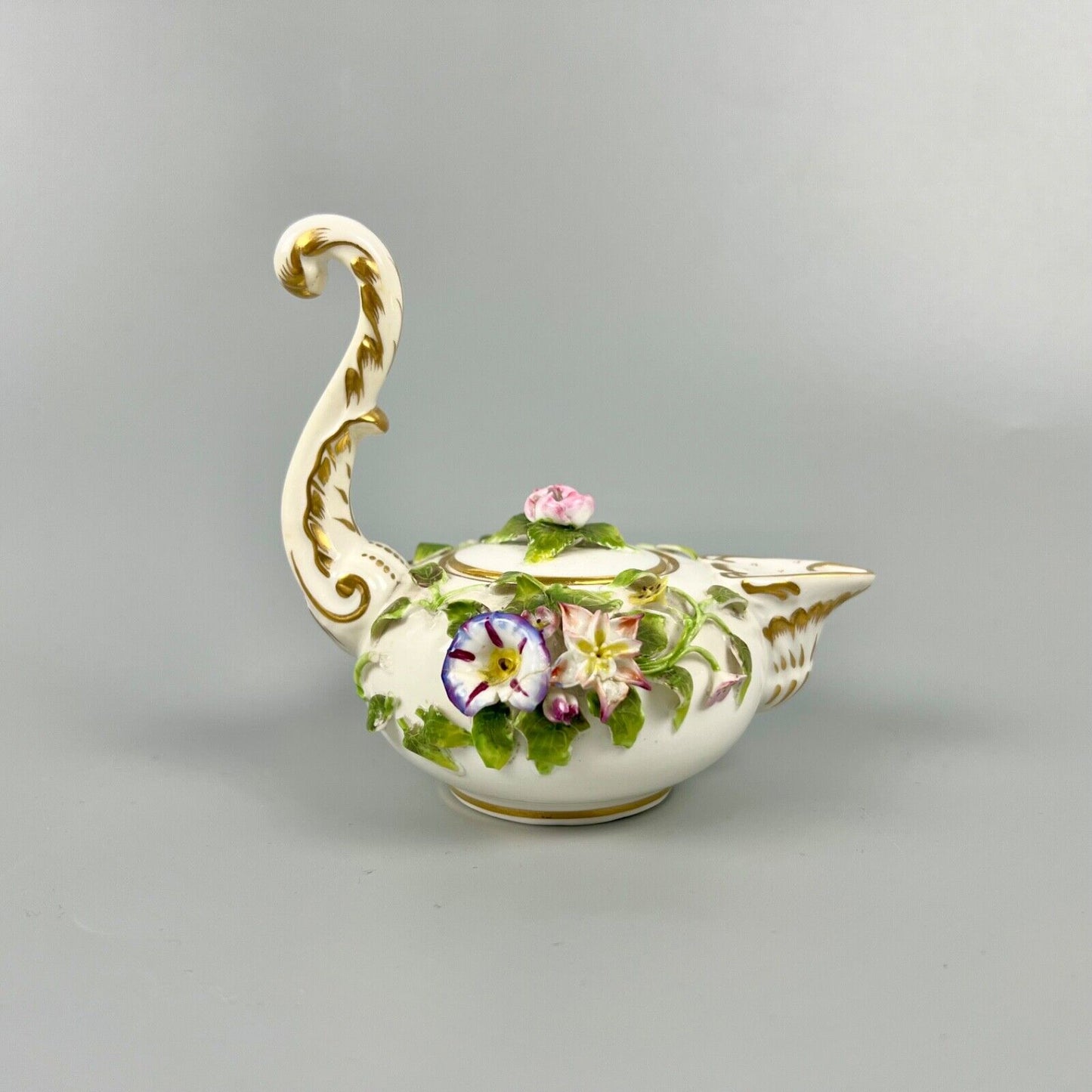 A mid 19thc Derby (Stevenson Hancock-puce version mark) miniature teapot c.1863
