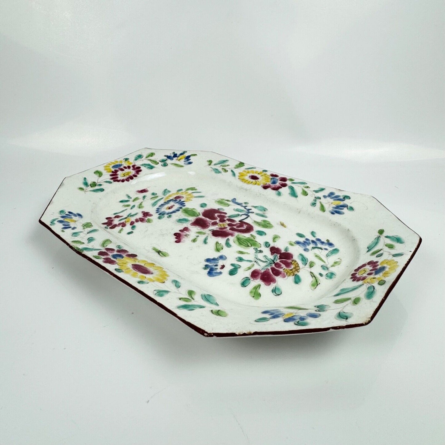 A small Bow platter painted in famille rose style c.1750-5