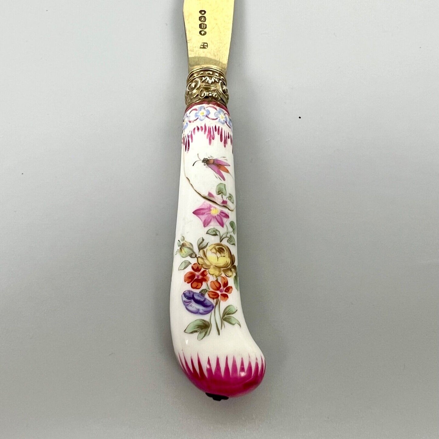 A sterling silver-gilt knife & fork set-the silver c.1863, the porcelain c.1760