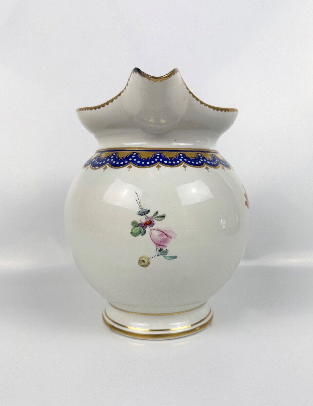 A rare Derby ewer Smith's blue rim and painted with flowers by Withers. c.1780