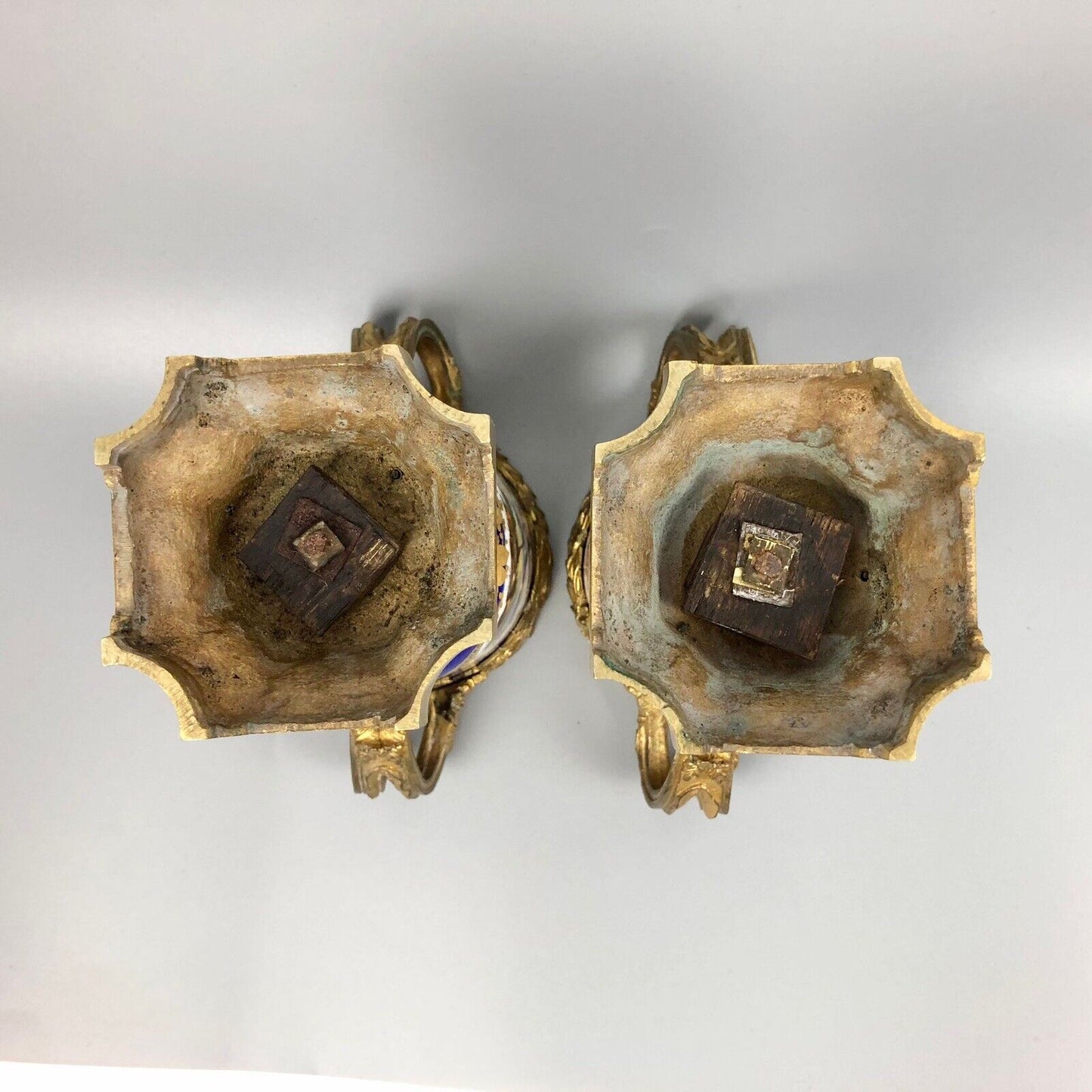 A pair of ormolu Sèvres-style vases painted with exotic birds and putti 1770