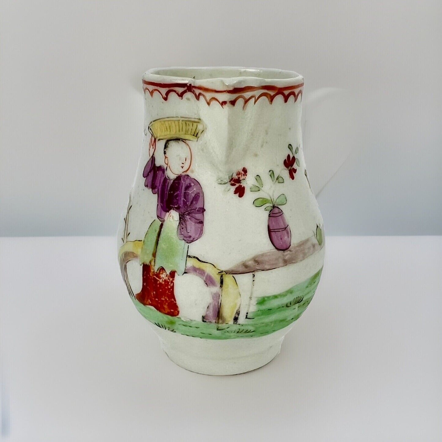 Unusual Lowestoft sparrowbeak creamer painted with a chinoiserie scene c.1770-5