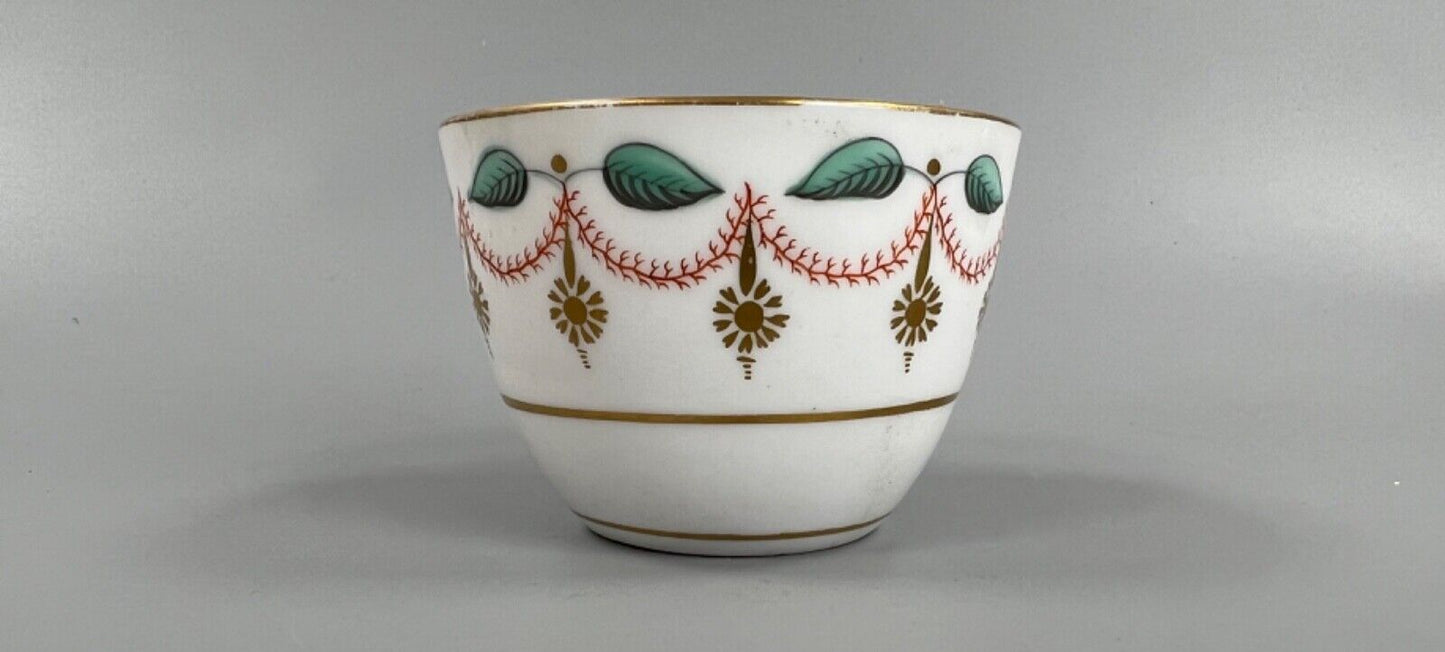An early 19thc bute shape New Hall cup and saucer in pattern number 1152