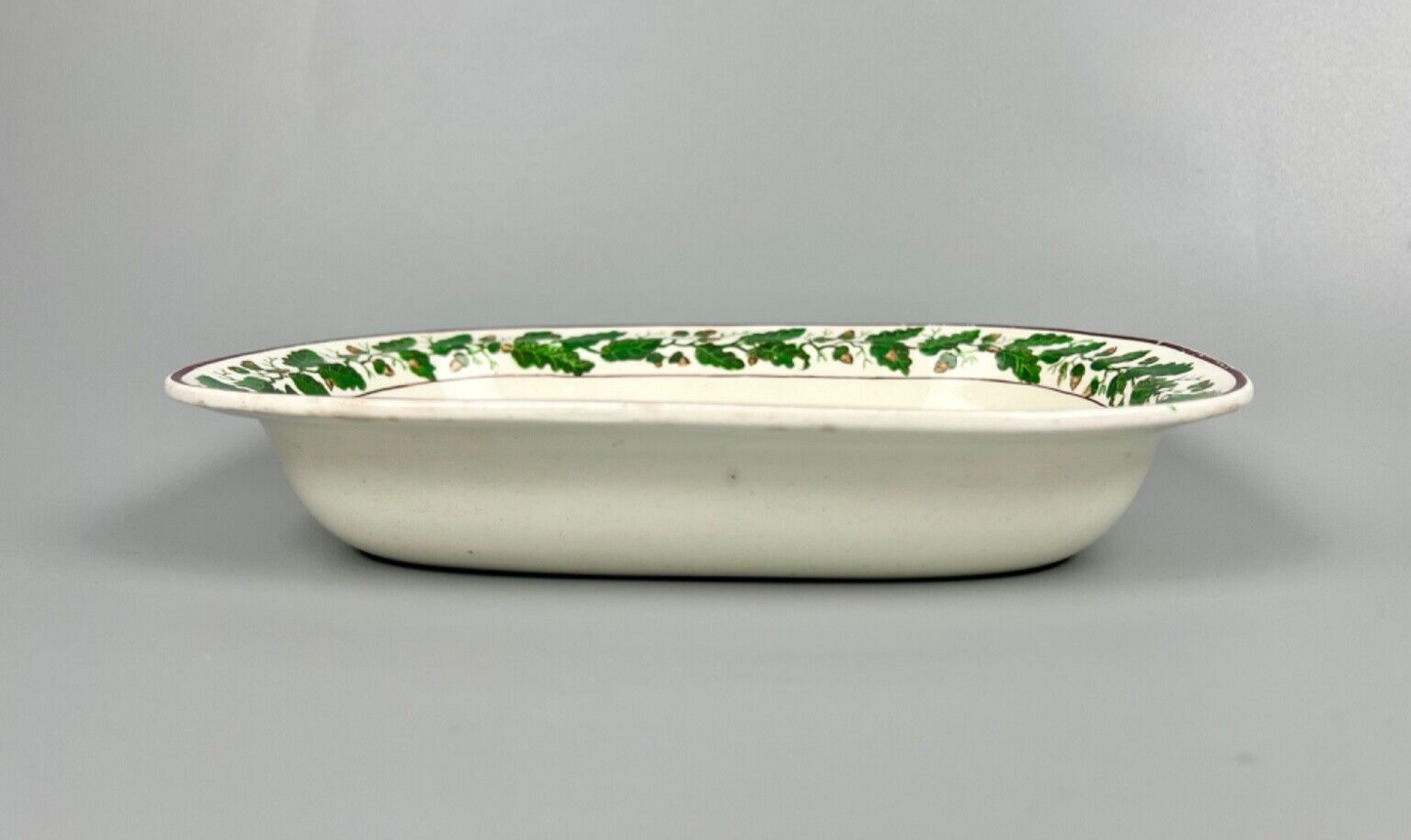 A Spode deep dish painted with oak leaves and acorns c.1810-20