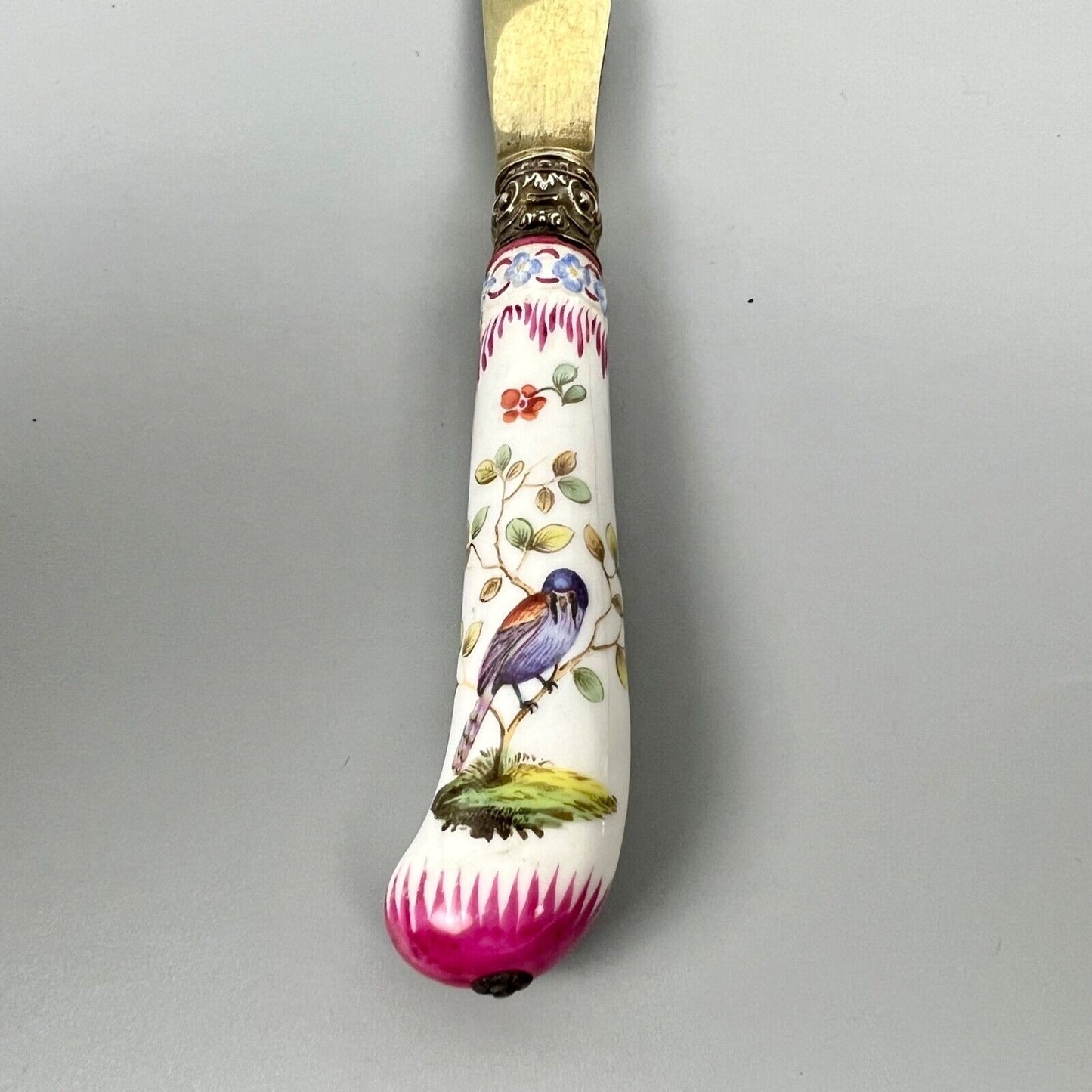 A sterling silver-gilt knife & fork set-the silver c.1863, the porcelain c.1760
