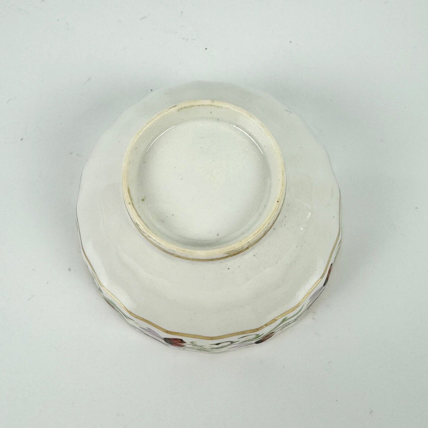 A Pinxton teabowl & saucer in a known pattern of unrecorded number circa 1805