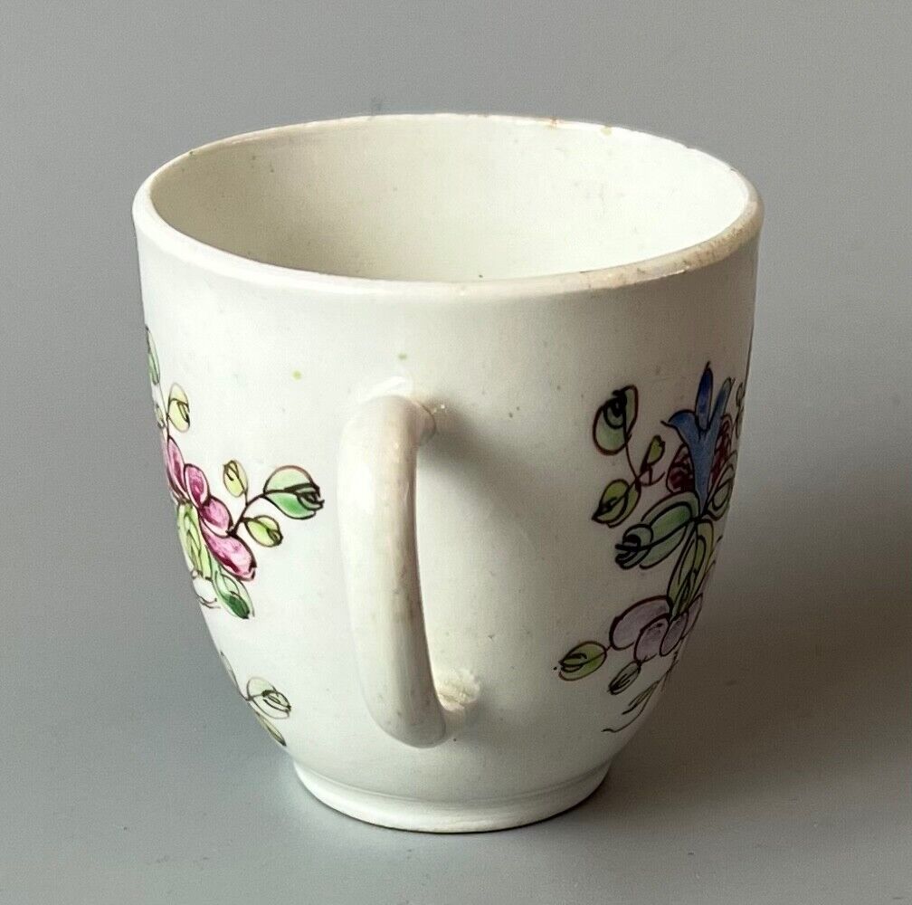 An early Bow coffee cup painted with floral sprays in famille rose stylec.1750-3