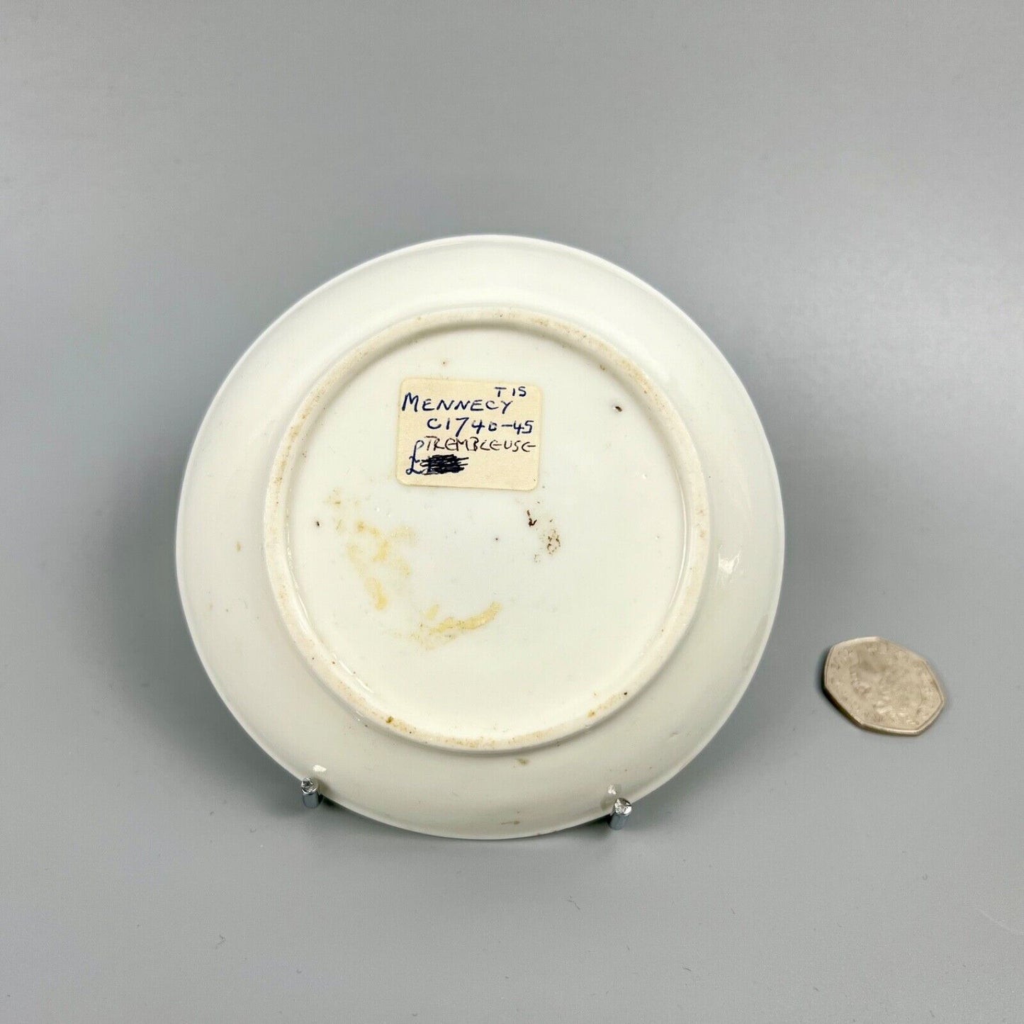 A rare St Cloud trembleuse saucer with prunus relief-moulding c.1735