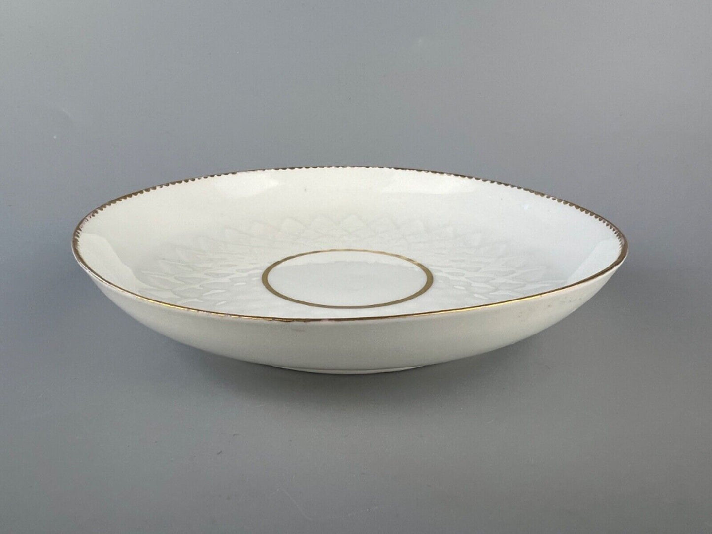 An artichoke-moulded 18thc Derby saucer dish. Puce Derby mark.