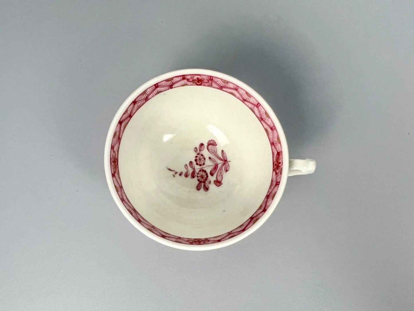 A rare Worcester reeded teacup and saucer painted in Meissen style. c.1772
