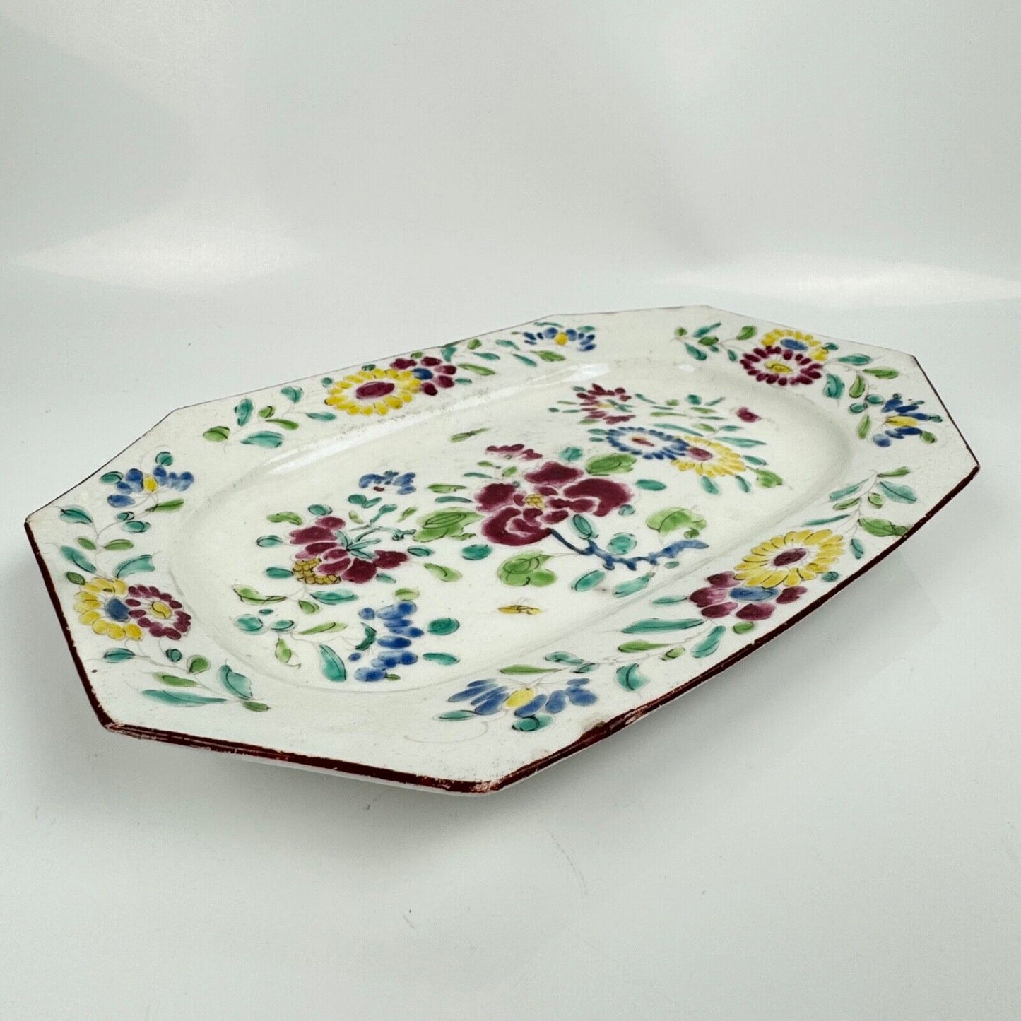 A small Bow platter painted in famille rose style c.1750-5