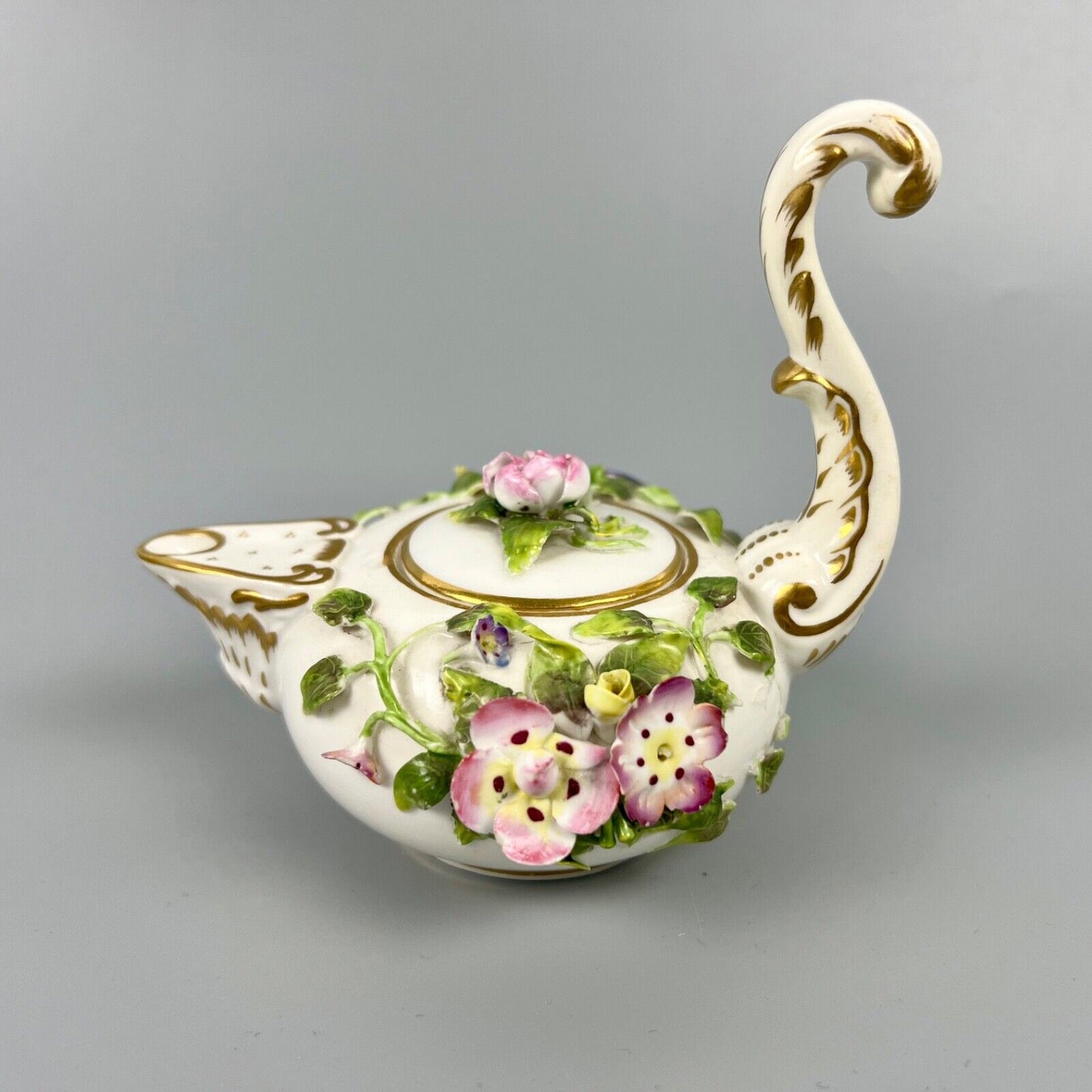 A mid 19thc Derby (Stevenson Hancock-puce version mark) miniature teapot c.1863