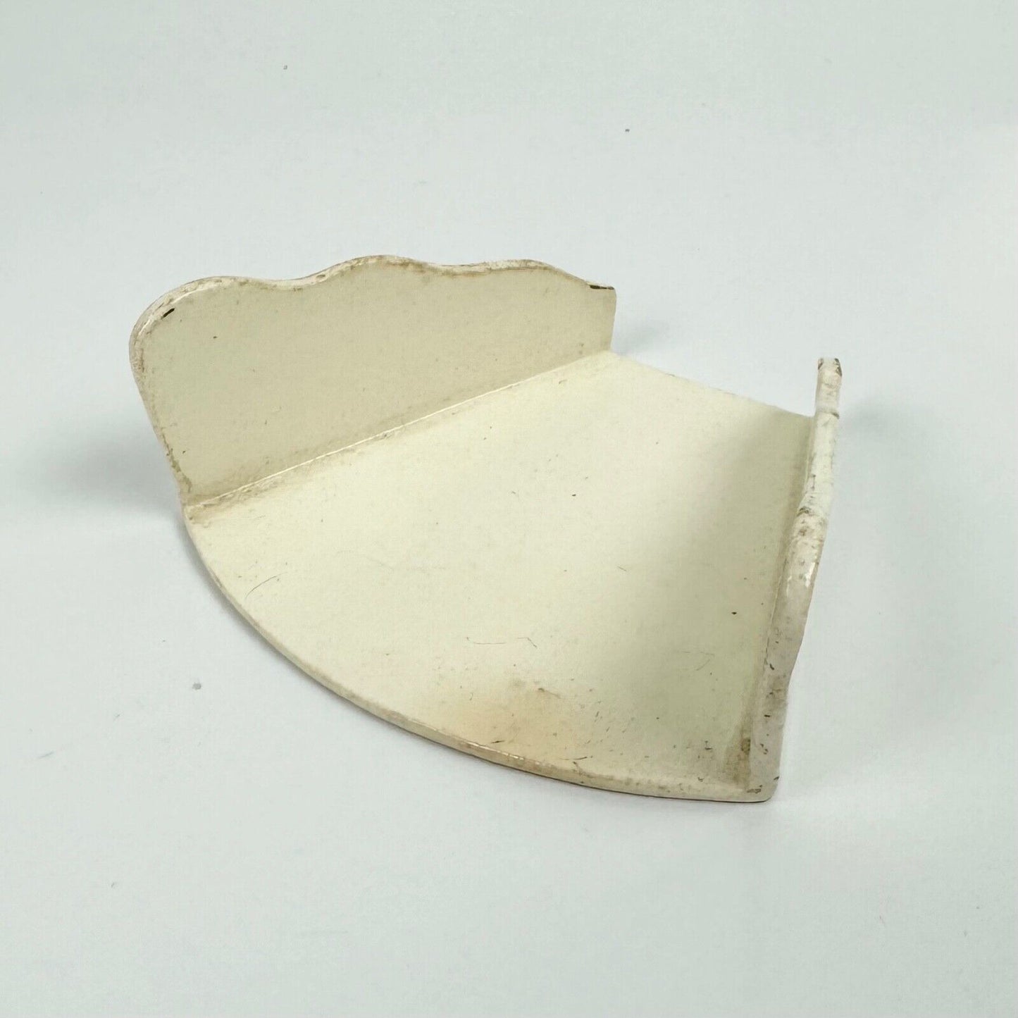 A c.1780-90 creamware asparagus server of trapezoid form with scalloped edges.