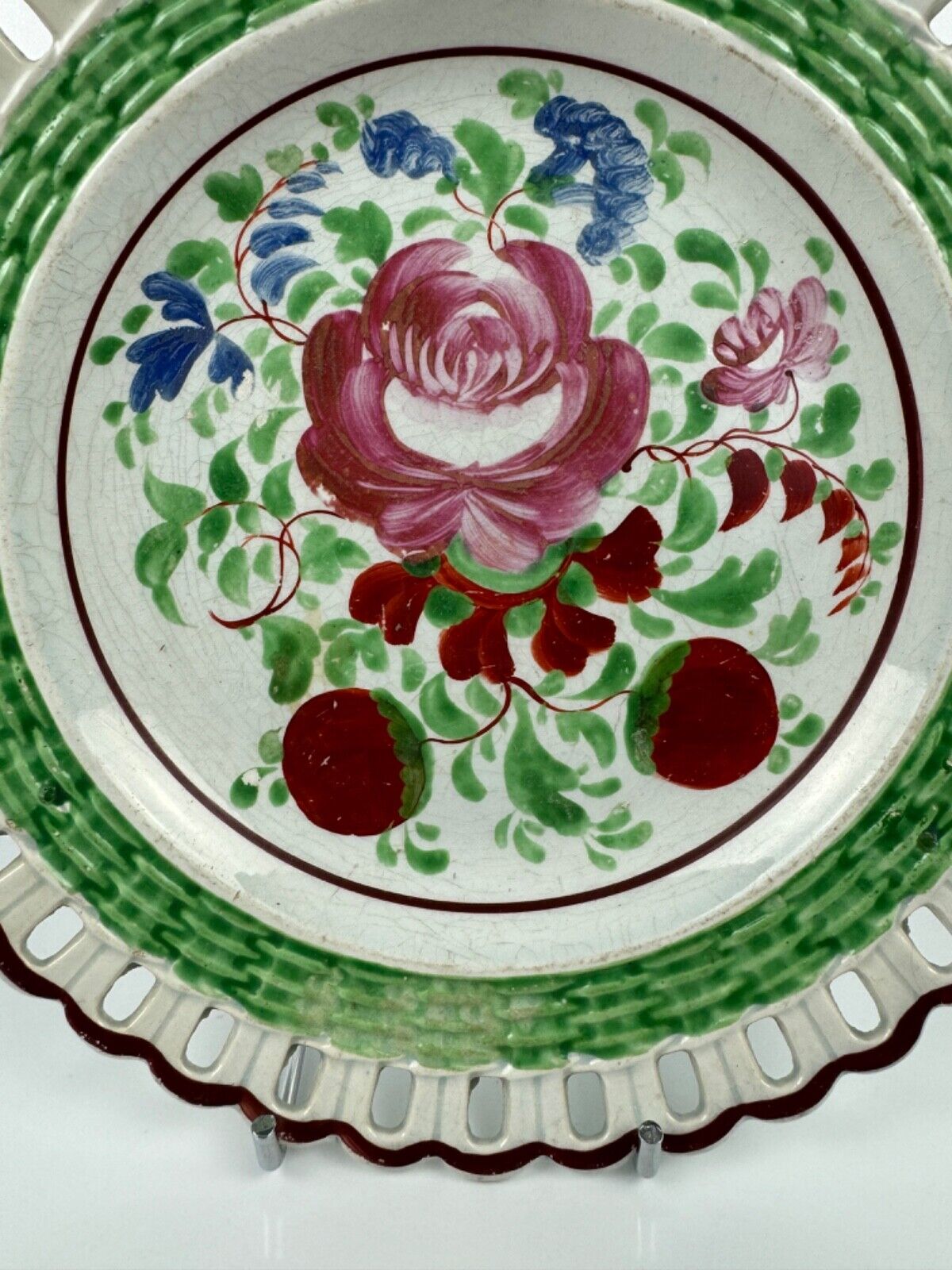 A Glamorgan Pottery, Swansea, reticulated and hand-painted plate c.1814-20