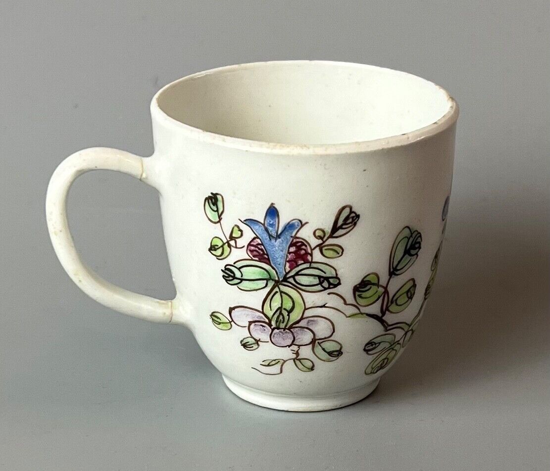 An early Bow coffee cup painted with floral sprays in famille rose stylec.1750-3