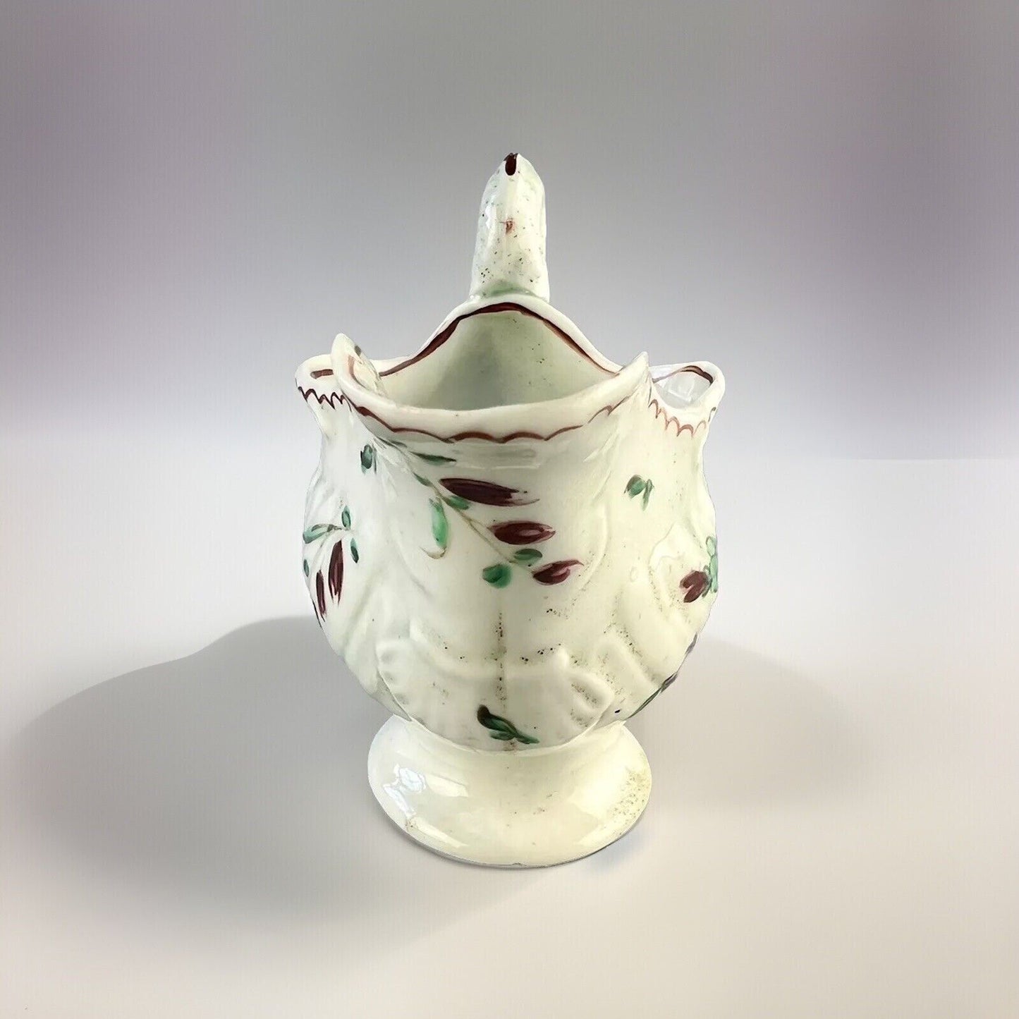 A Philip Christian Liverpool porcelain lamprey handled cream jug c.1775