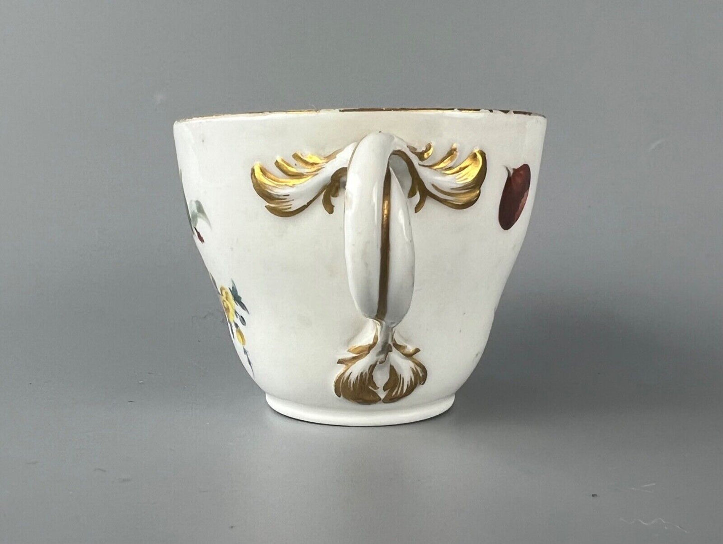 A set of four Meissen Marcolini Period c.1800 bifurcated-handle coffee cups.